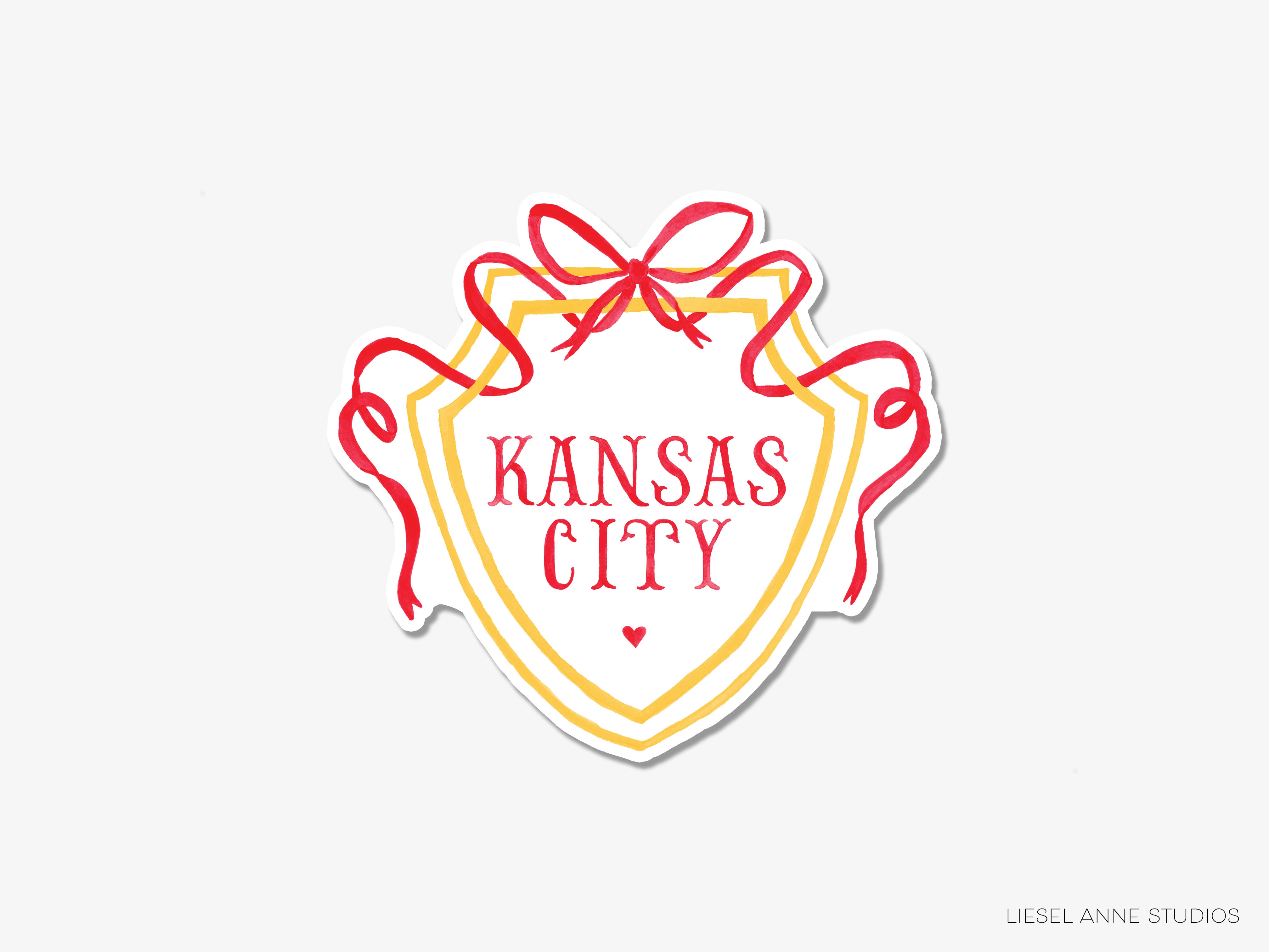a kansas city sticker with a bow on it