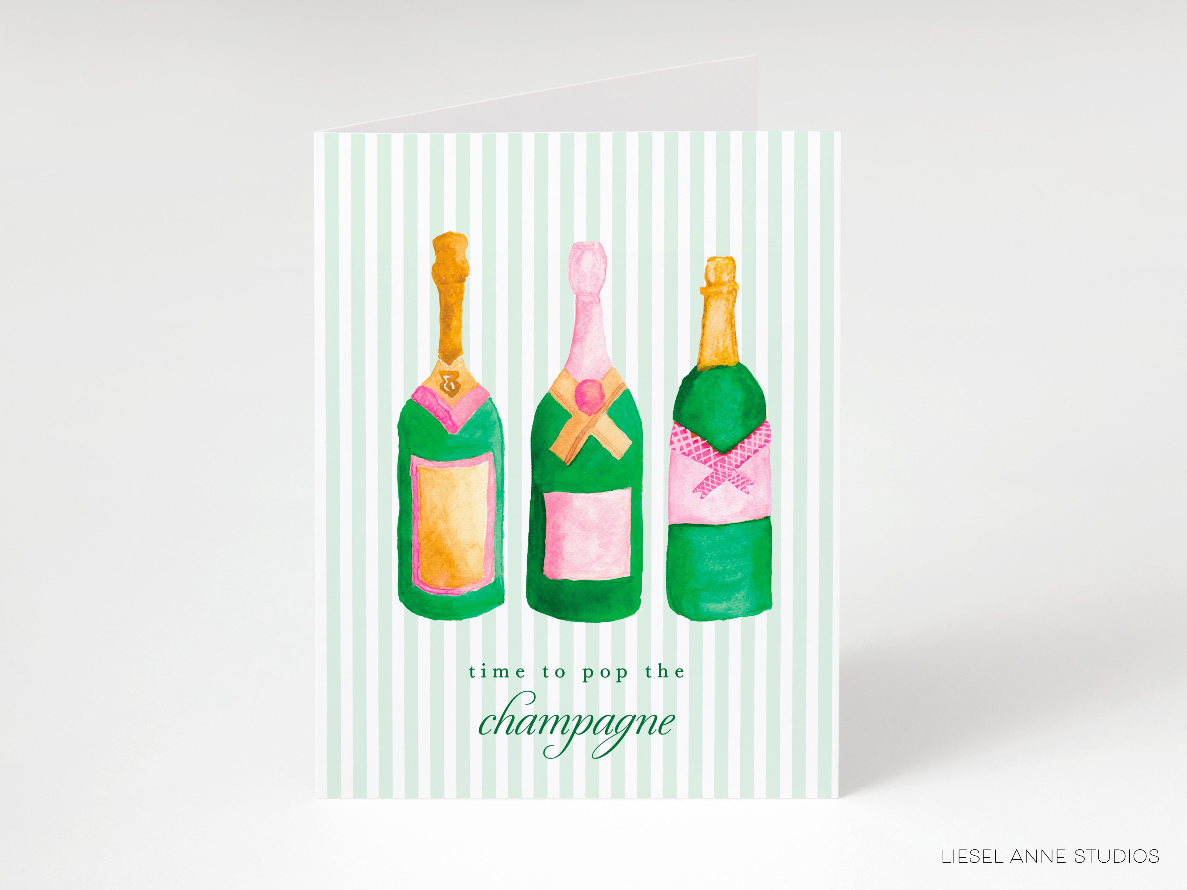 a card with three bottles of champagne on it