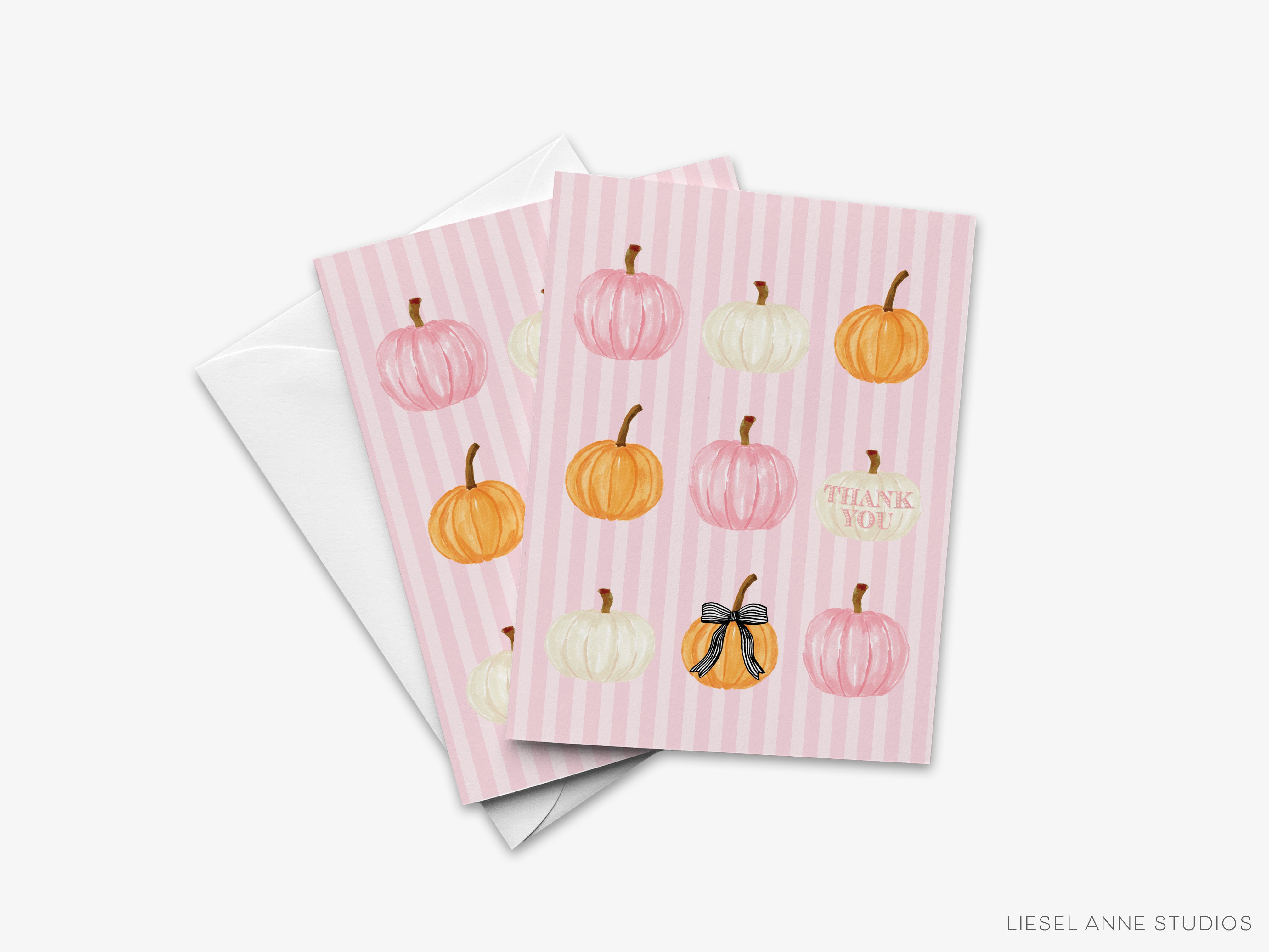 A pink striped card with illustrations of pumpkins and a "Thank You" message.
