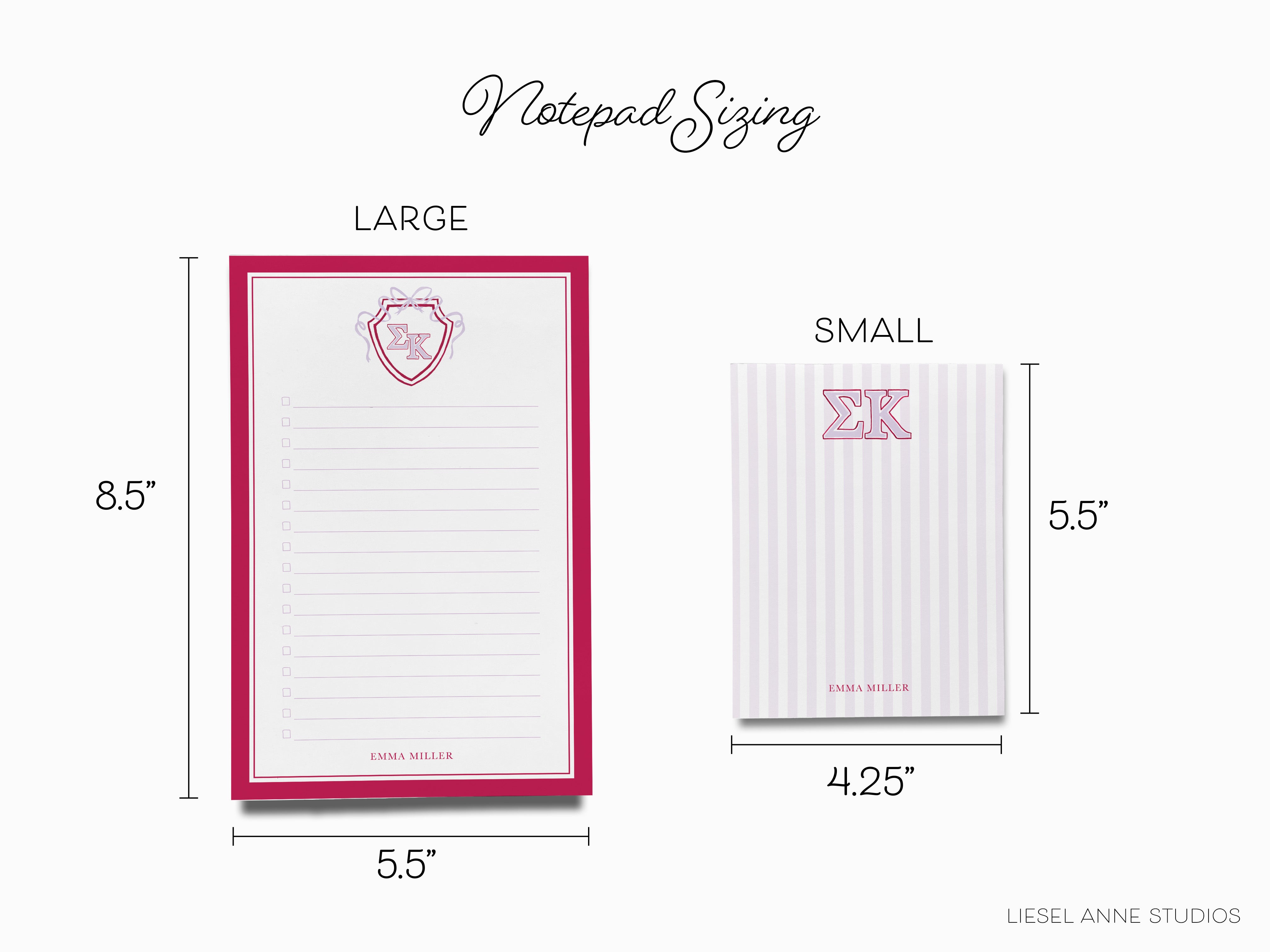a notepad and a notepad with a heart on it