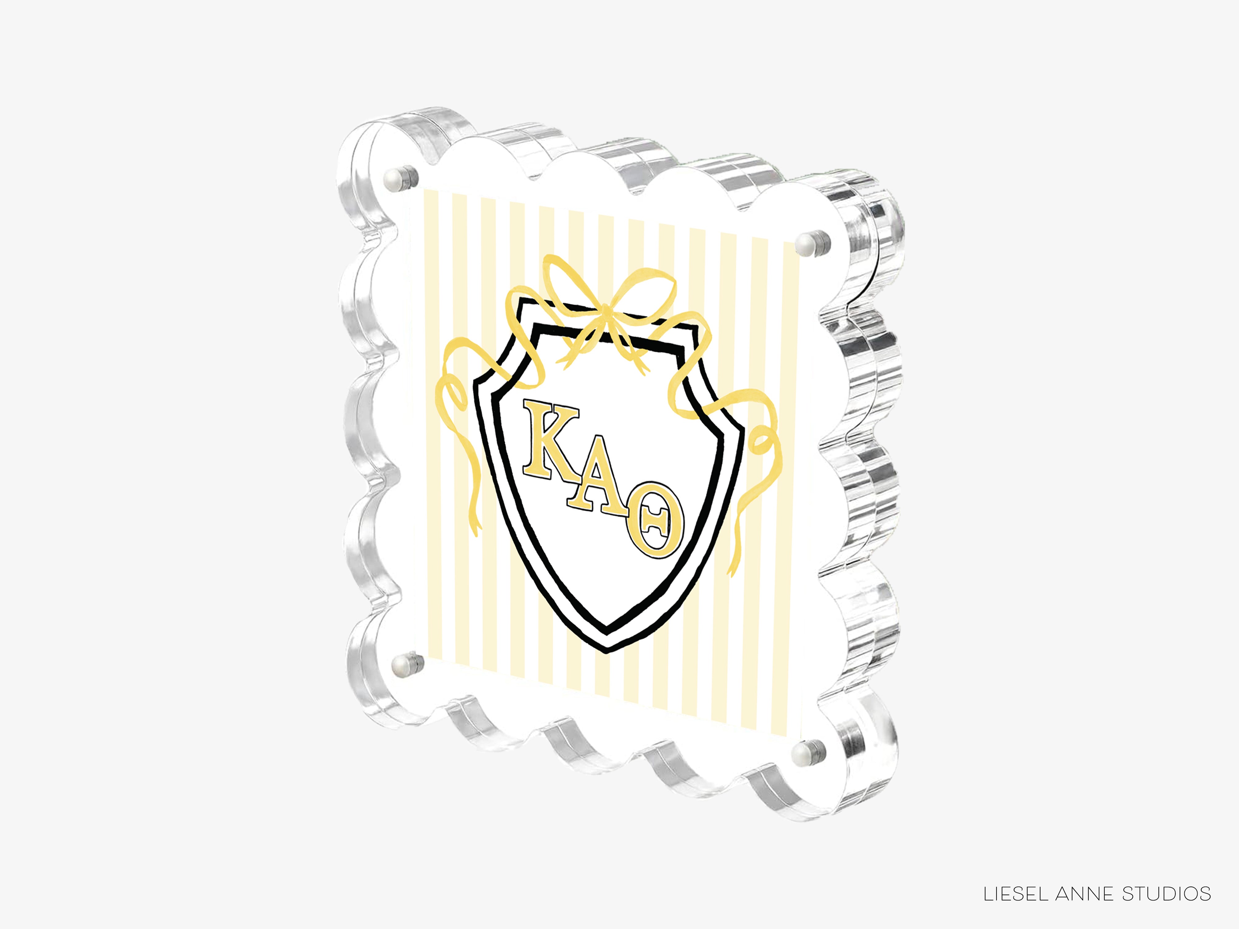 A 3D printed object with a shield-shaped design and the letters 'KA' prominently displayed.