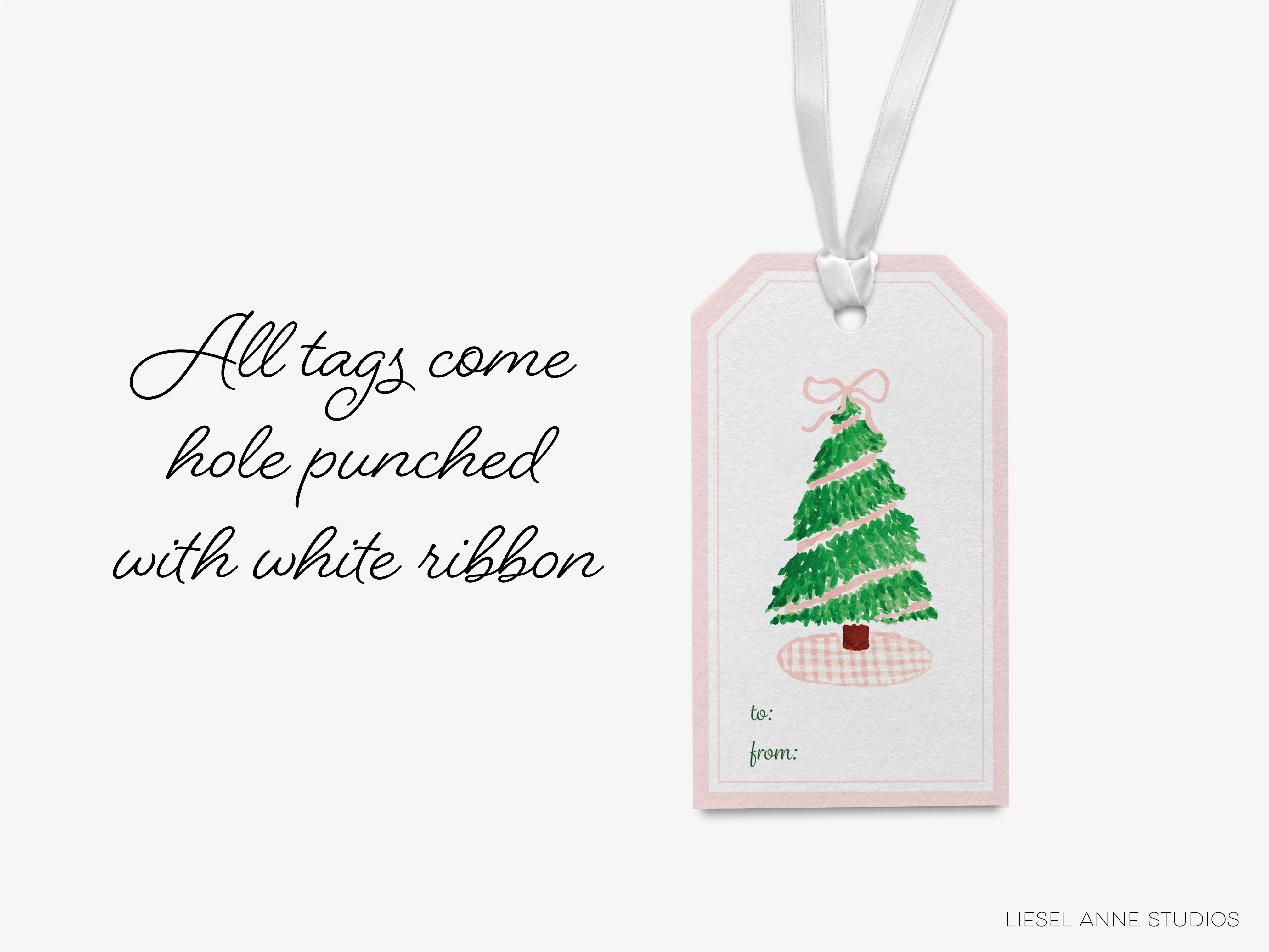 A white ribbon Christmas tree tag with a bow, hanging from a ribbon.
