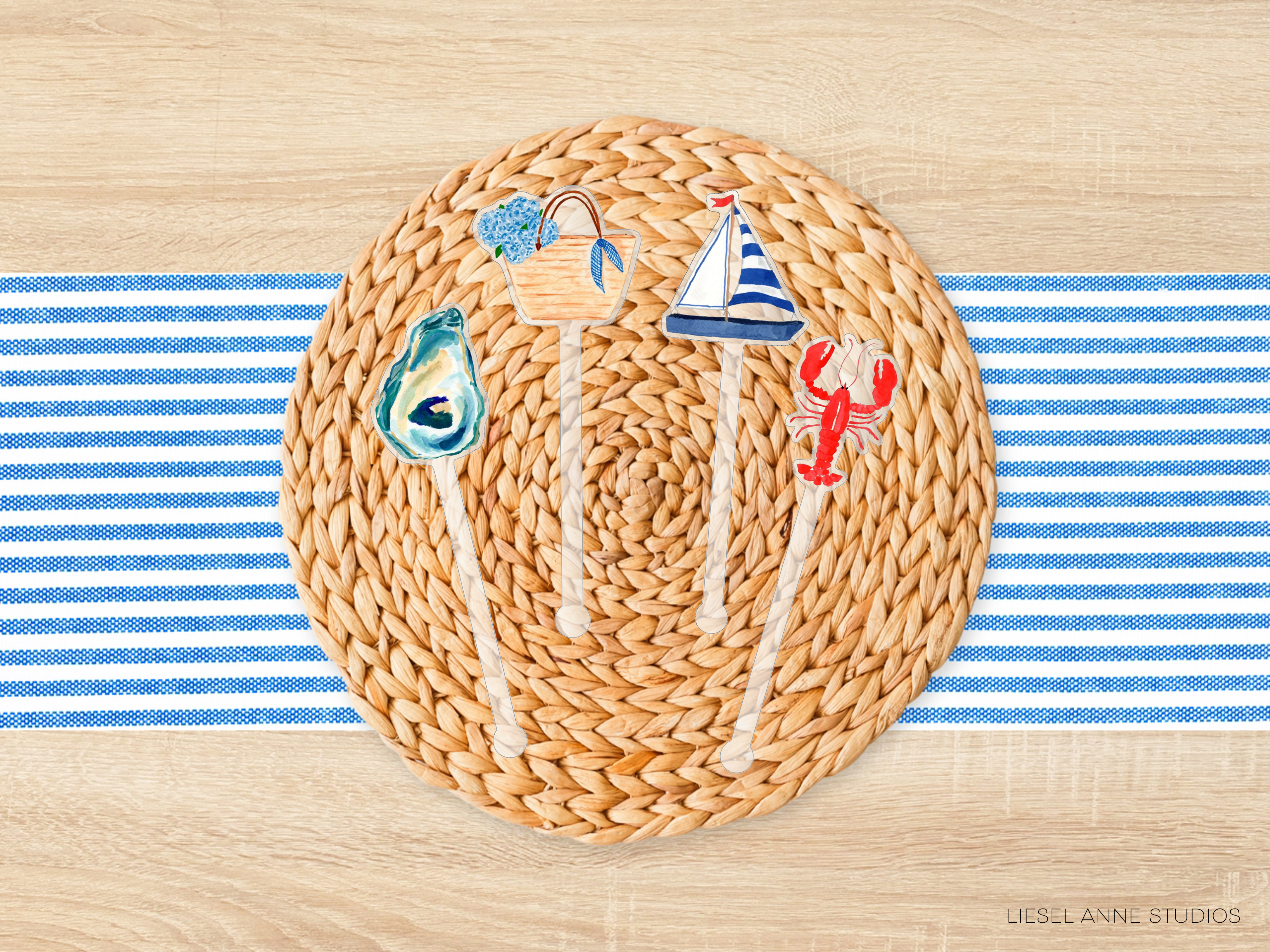 A woven placemat with a blue and white striped pattern, featuring four decorative objects: an oyster shell, a basket, a lobster, and a sailboat.