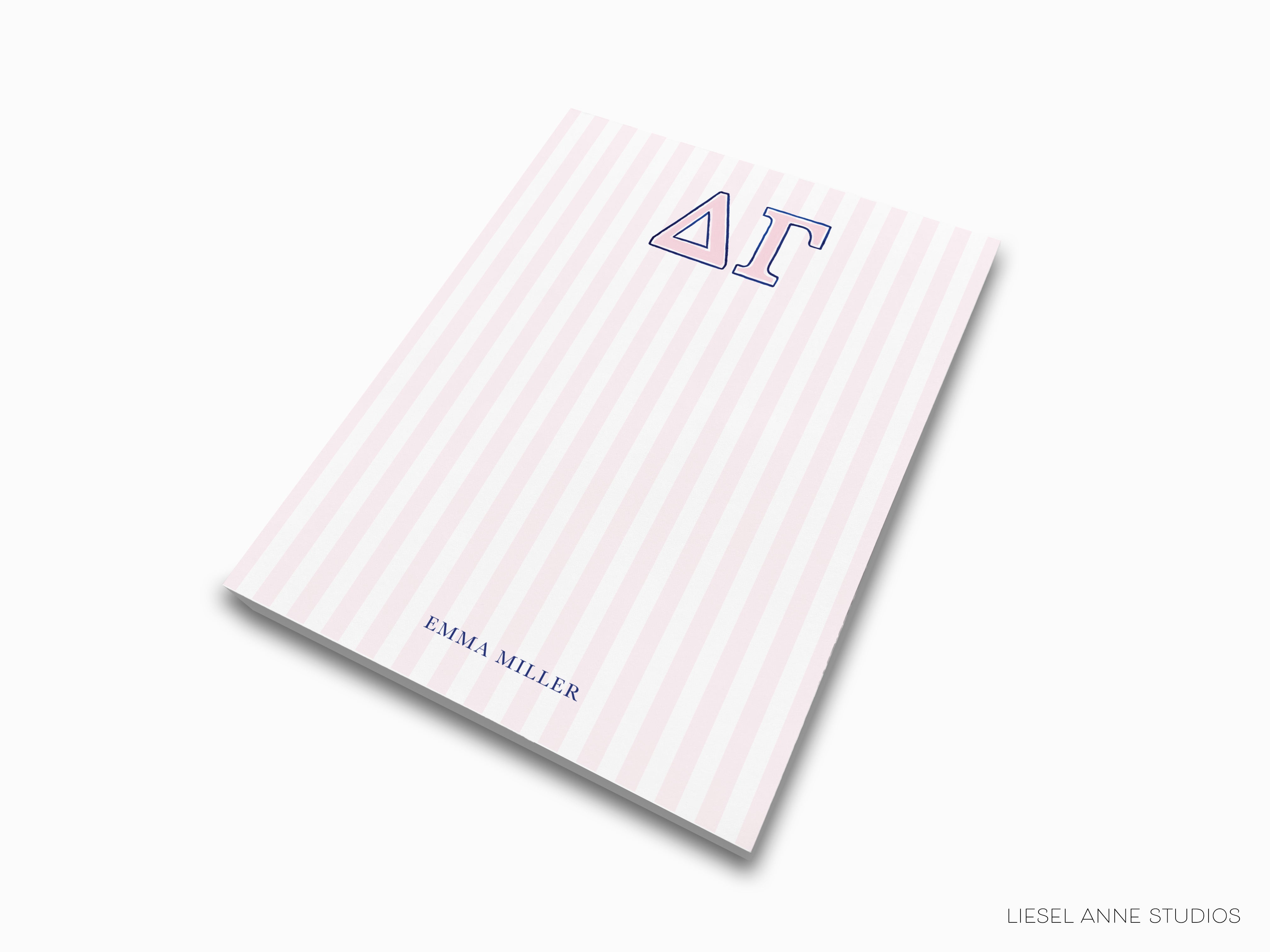a pink and white striped notebook with the number 41 on it