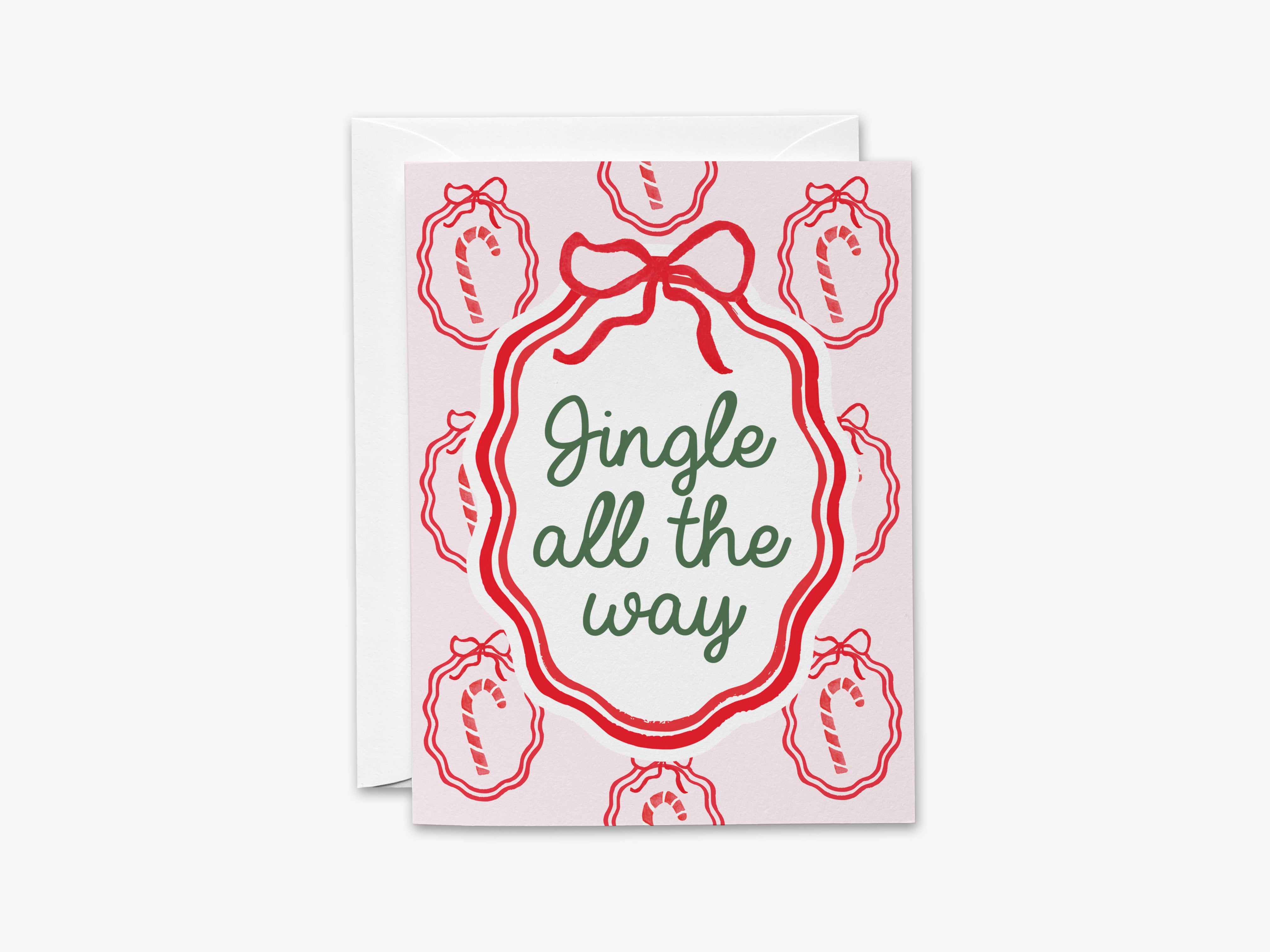 A greeting card with a festive design featuring red and white candy canes and a red ribbon around a central text that reads "Jingle all the way".