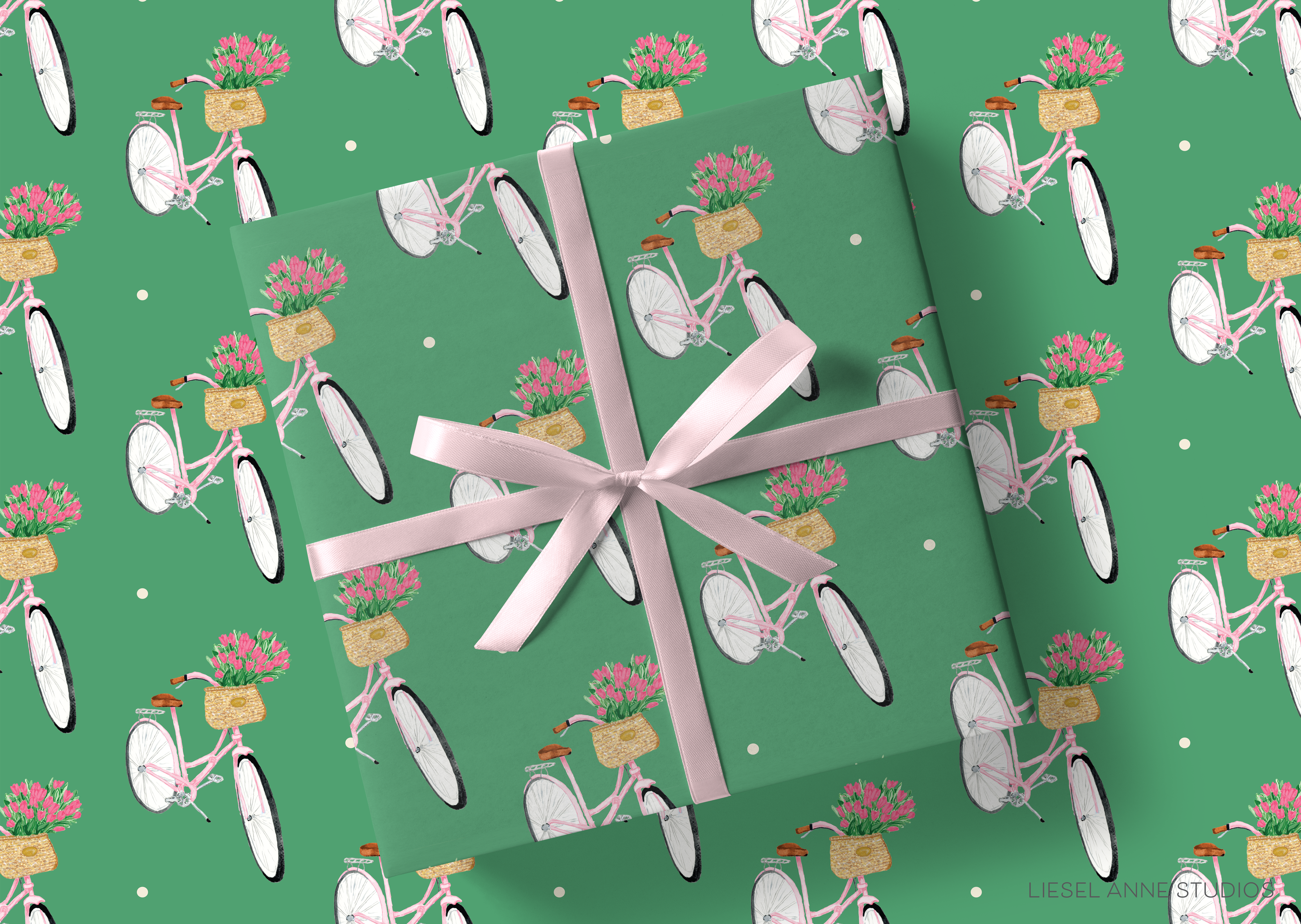 a pattern of pink bicycles with baskets of flowers on them, all set against a green background. The bicycles are arranged in a repeating pattern, creating a visually appealing and harmonious design.