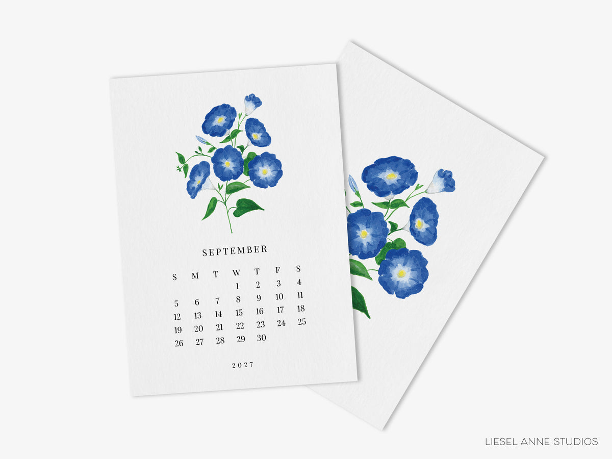 The image is a calendar page with a blue flower illustration on the left side and a calendar for September on the right side.