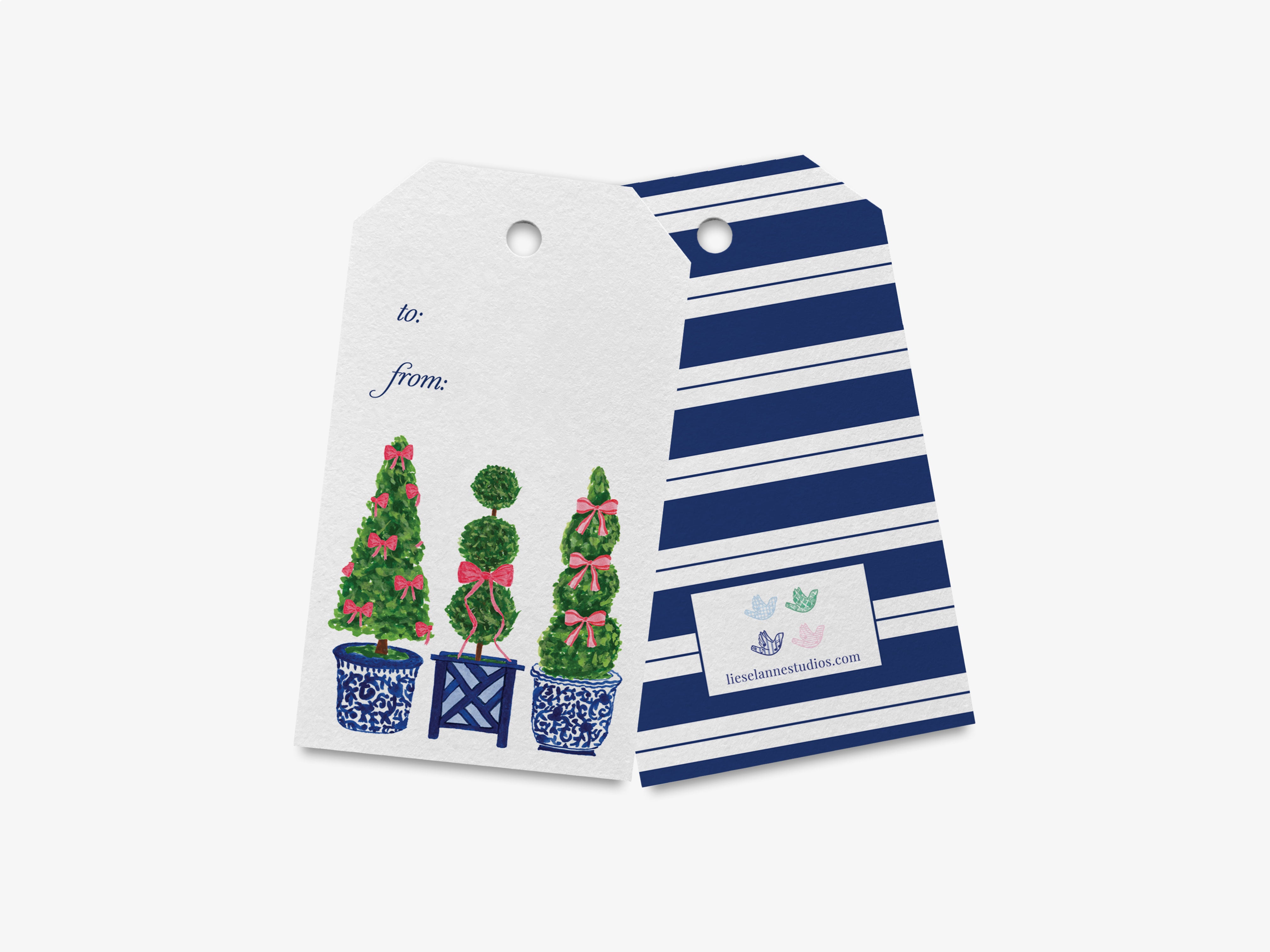 a white gift tag with a design of three Christmas trees in blue and white pots, along with a blue and white striped background.