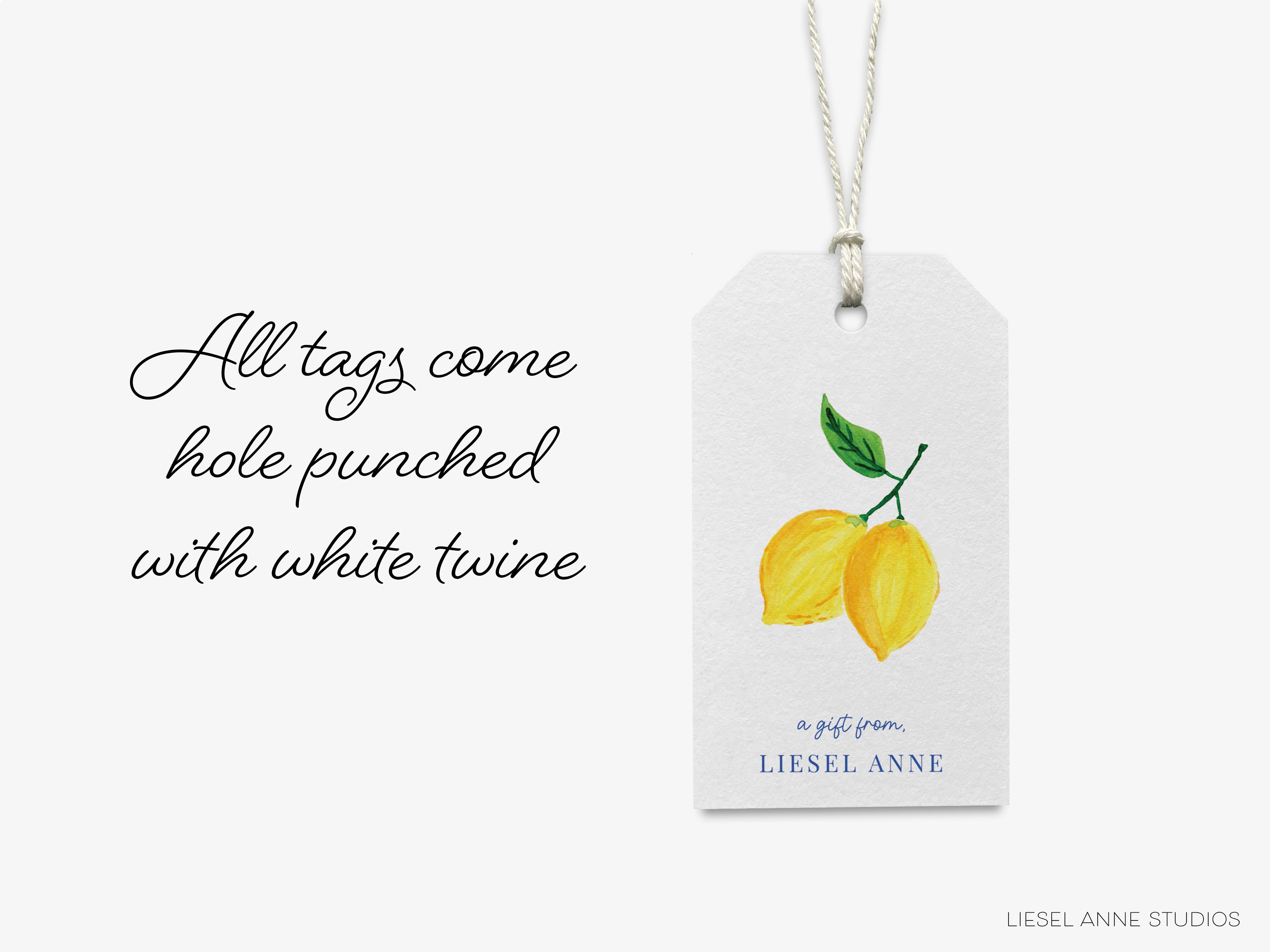 a white tag with a picture of a lemon on it