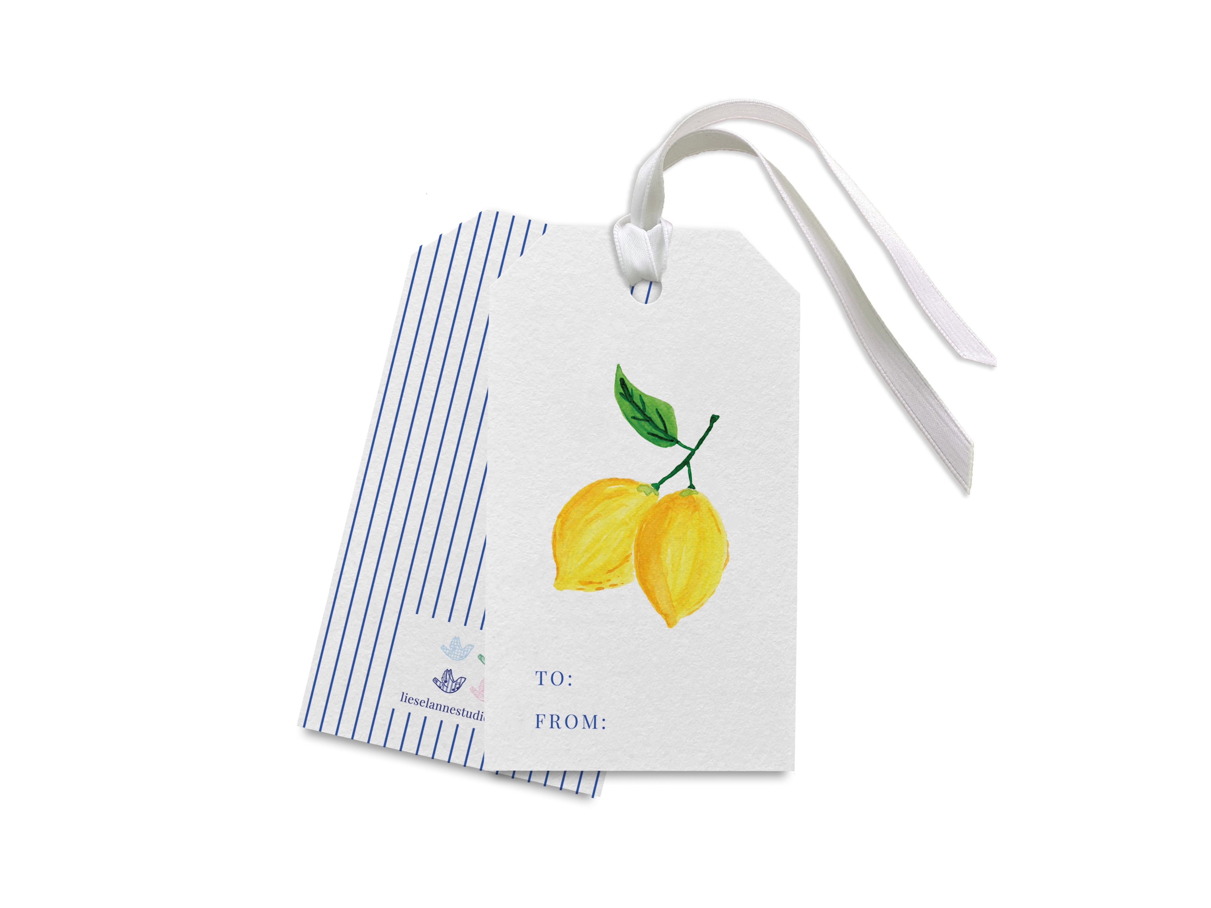 a pair of tags with a lemon on them