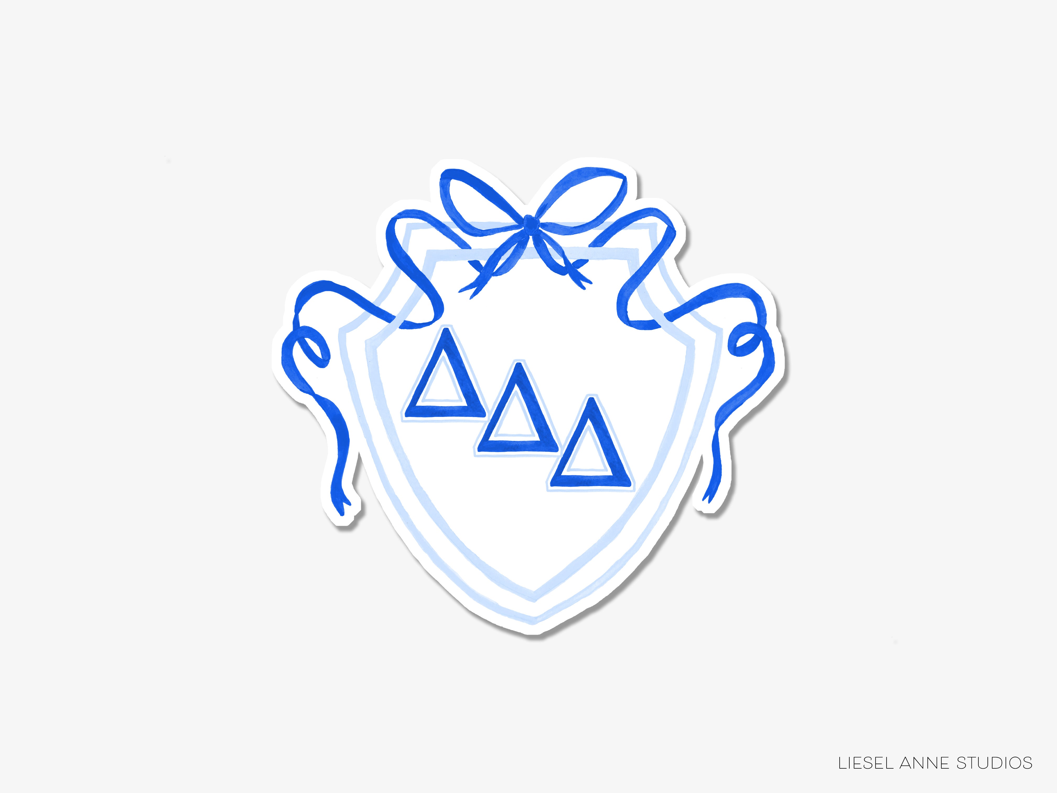 a blue and white sticker of a coat of arms