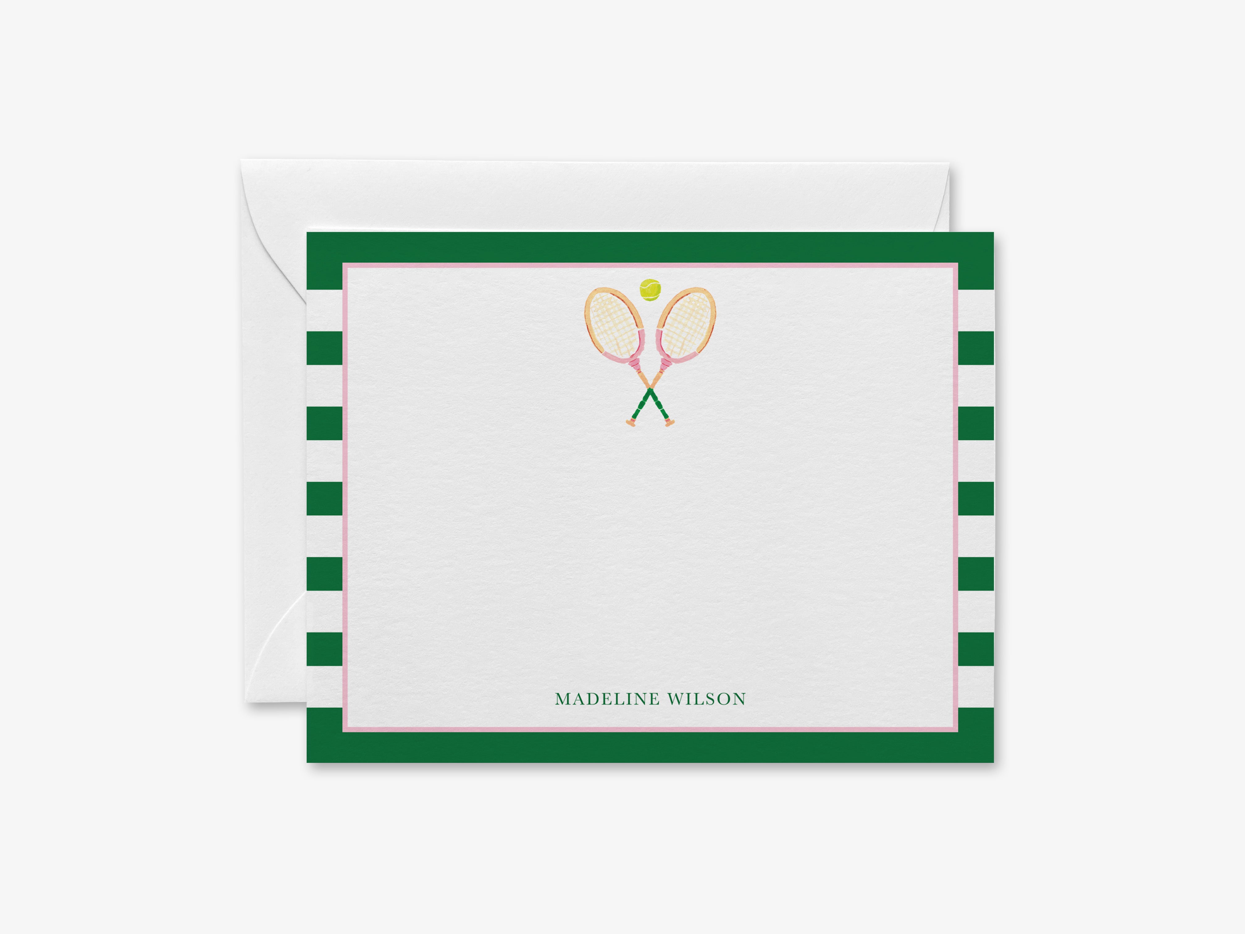 A personalized note card with a tennis racket and ball design, and the name "MADELINE WILSON" printed on it.