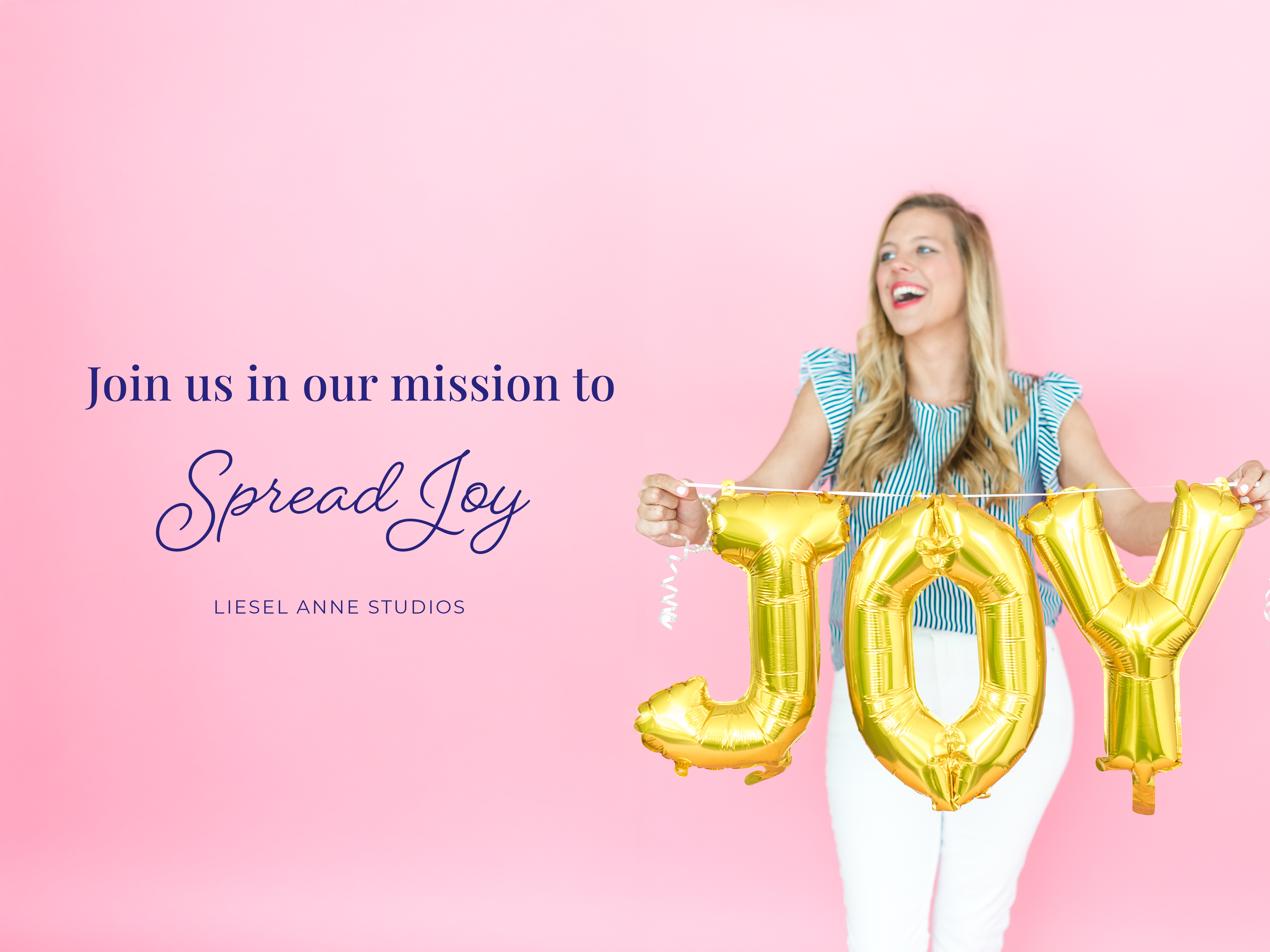 A woman holding large gold foil letters spelling "Joy" against a pink background.
