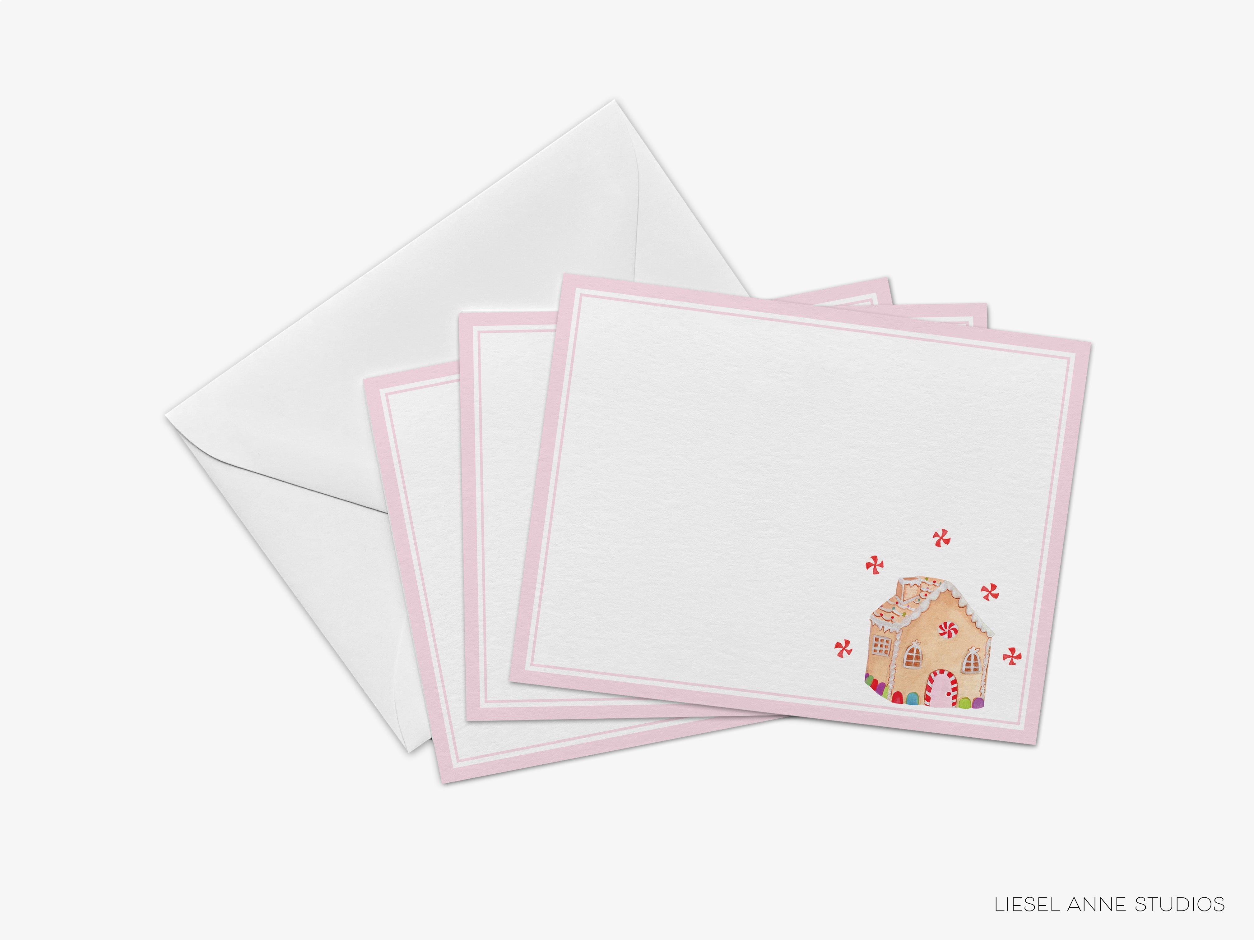 three cards with a picture of a gingerbread house