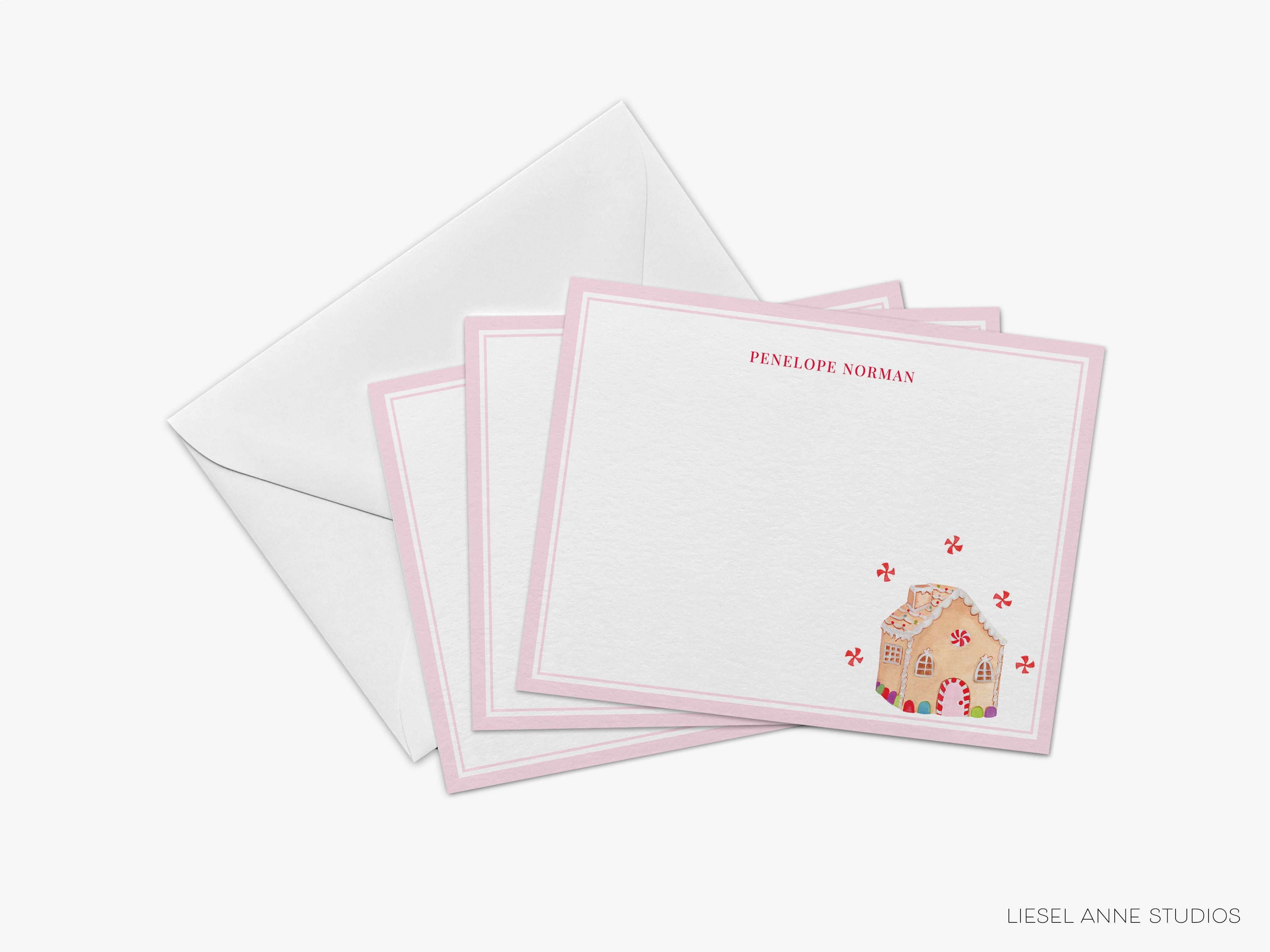 three cards with a gingerbread house on them
