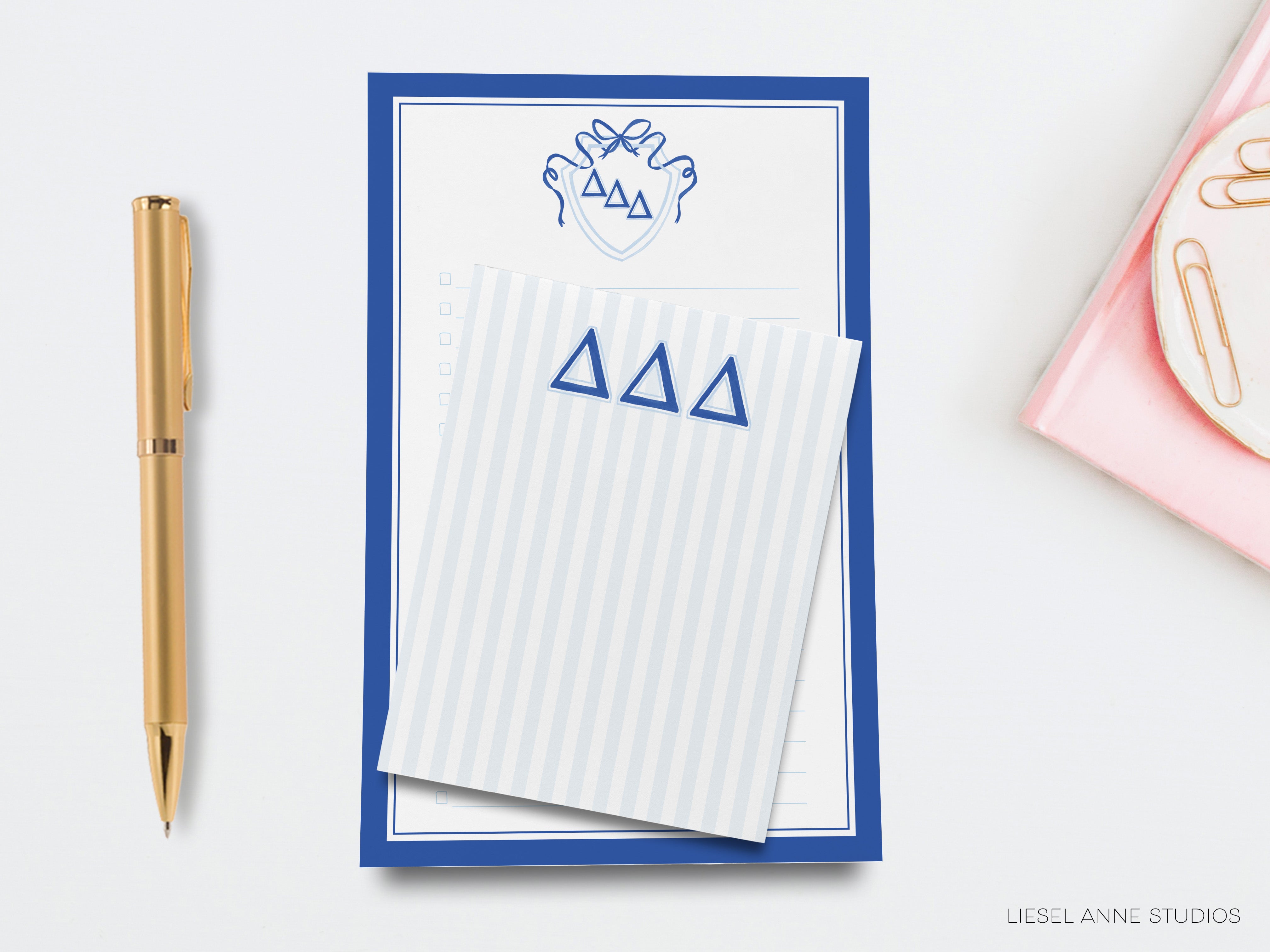 a notepad and pen next to a notepad