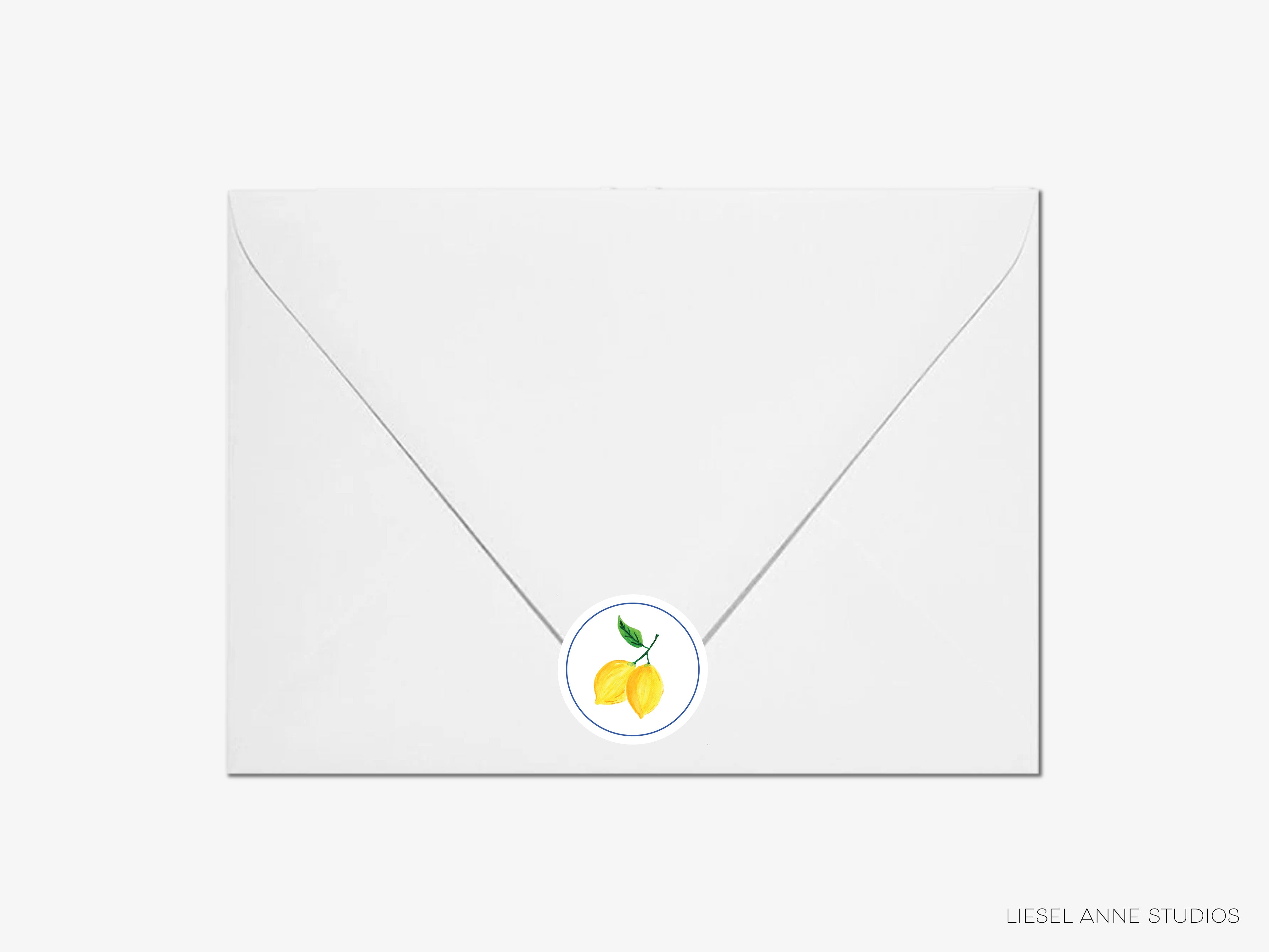 A white envelope with a sticker featuring a lemon graphic.