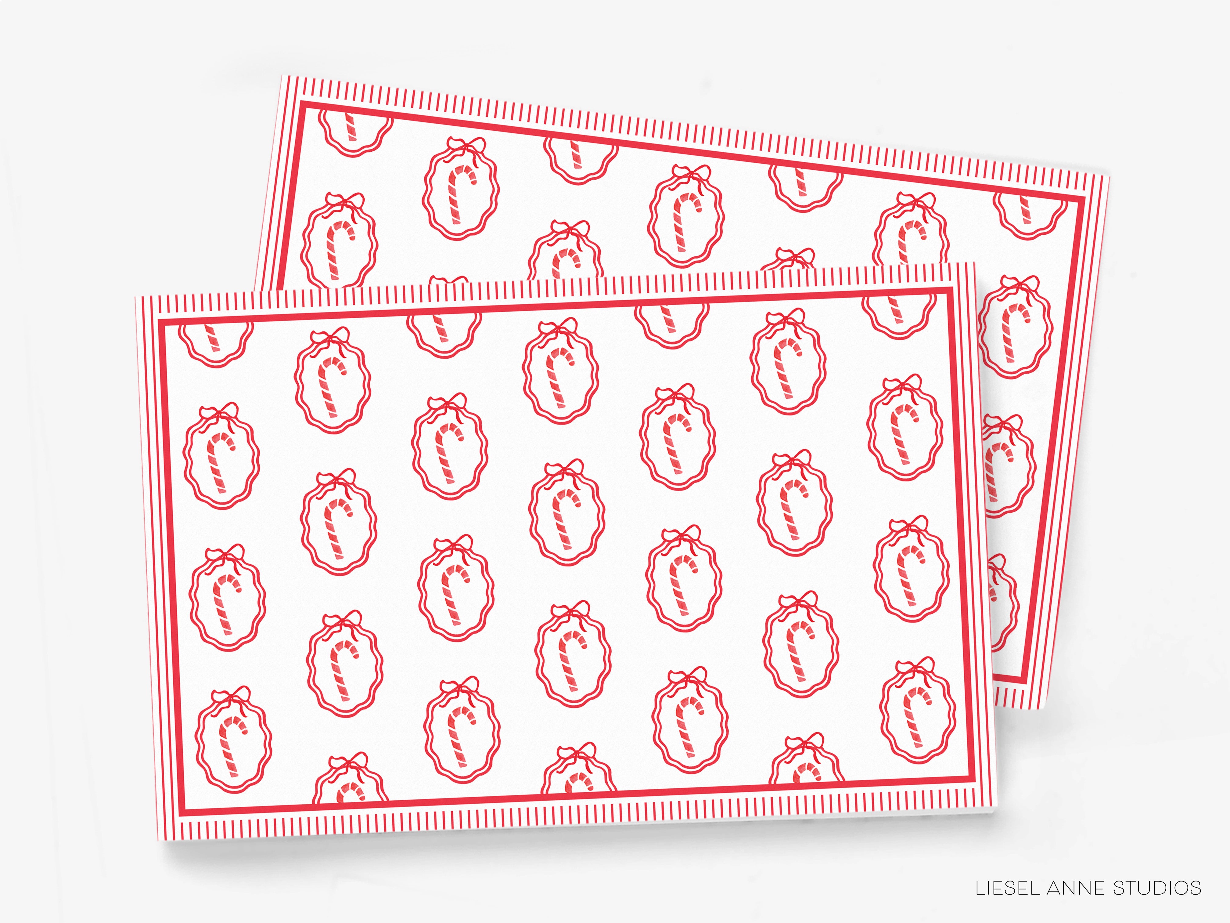 a repeating pattern of red and white candy canes on a white background.
