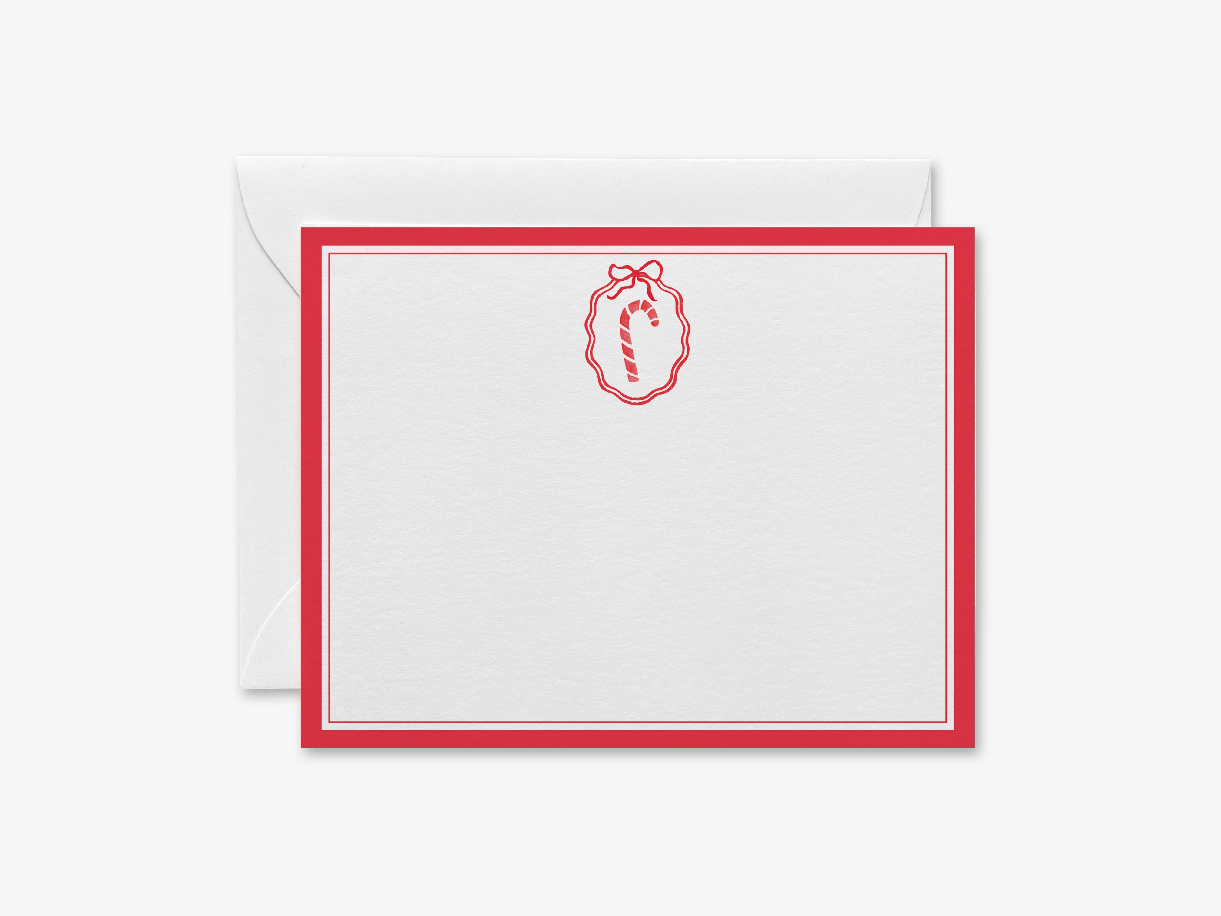 a white card with a red border and a red ribbon design on the top left corner.