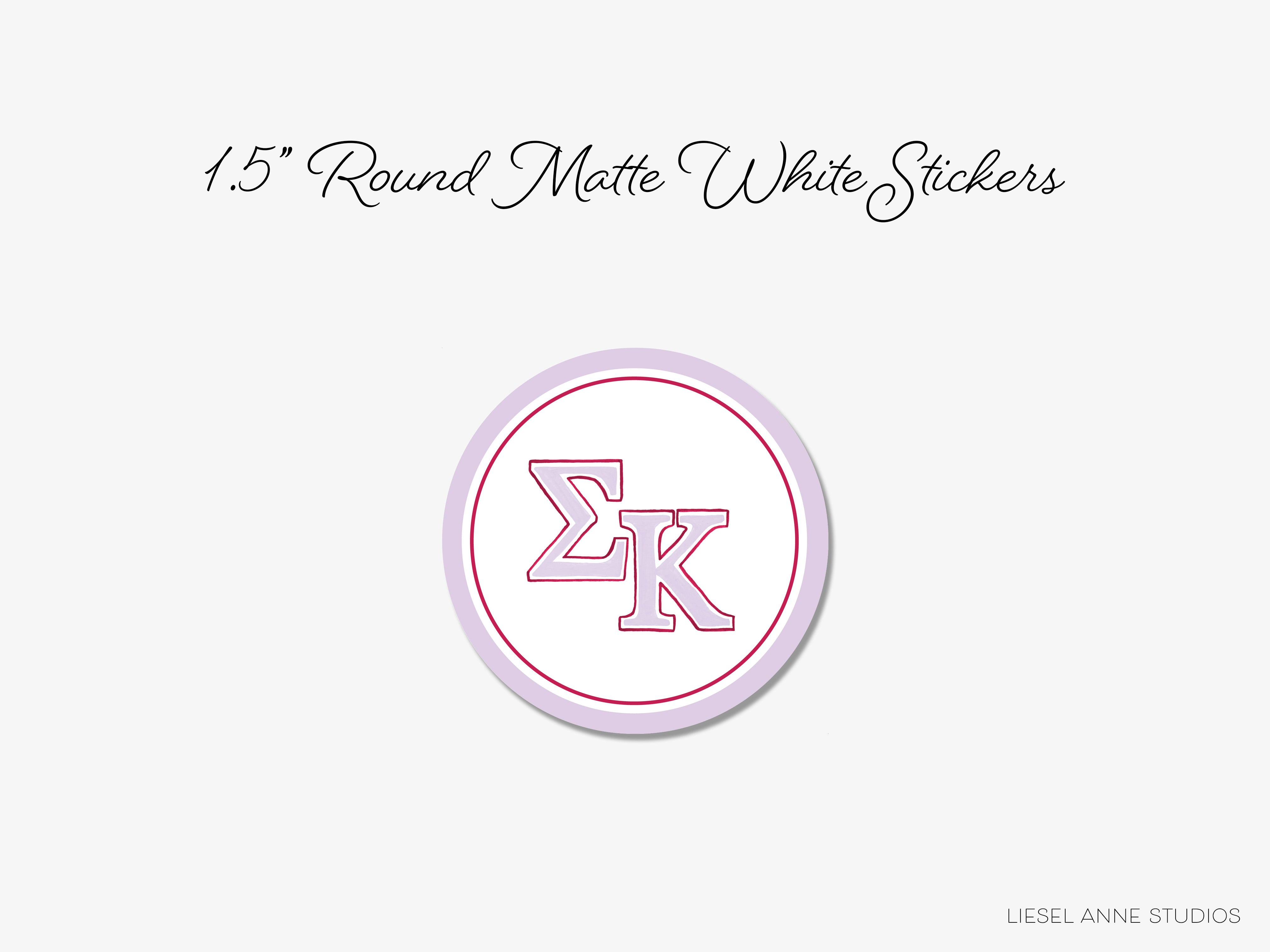 a white button with the letter k in it