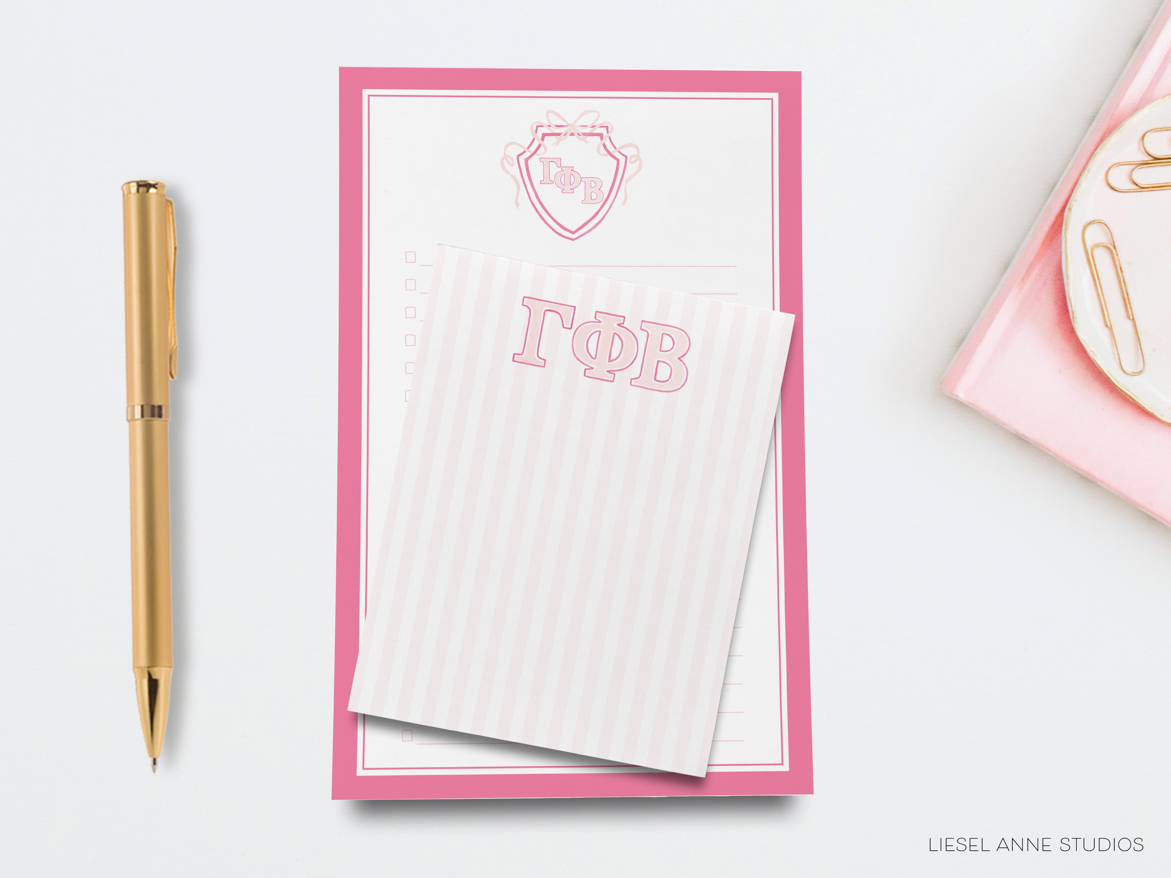 a notepad and pen next to a notepad