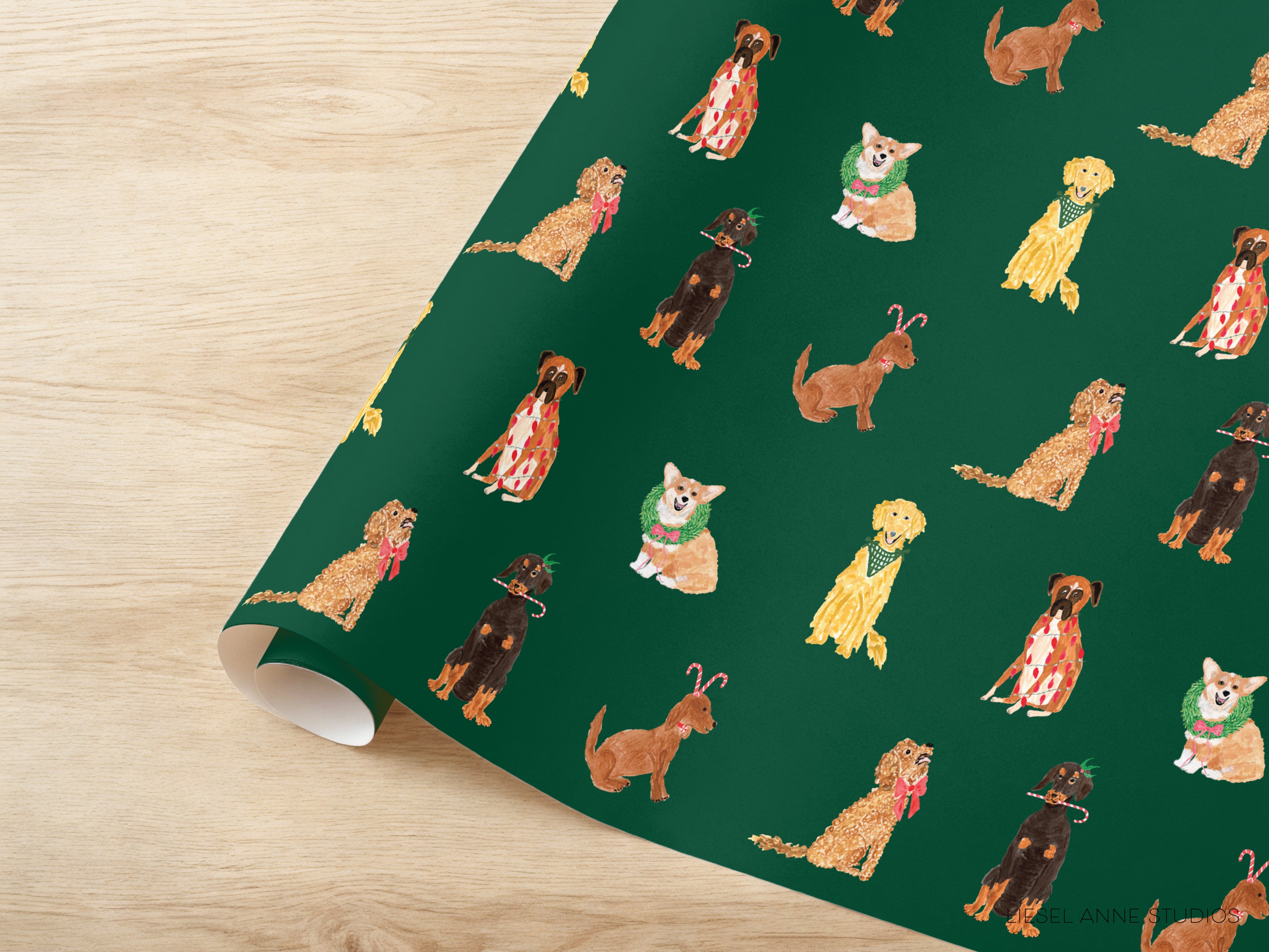 a repeating pattern of various dog breeds, including golden retrievers, corgi, and beagles, against a green background.