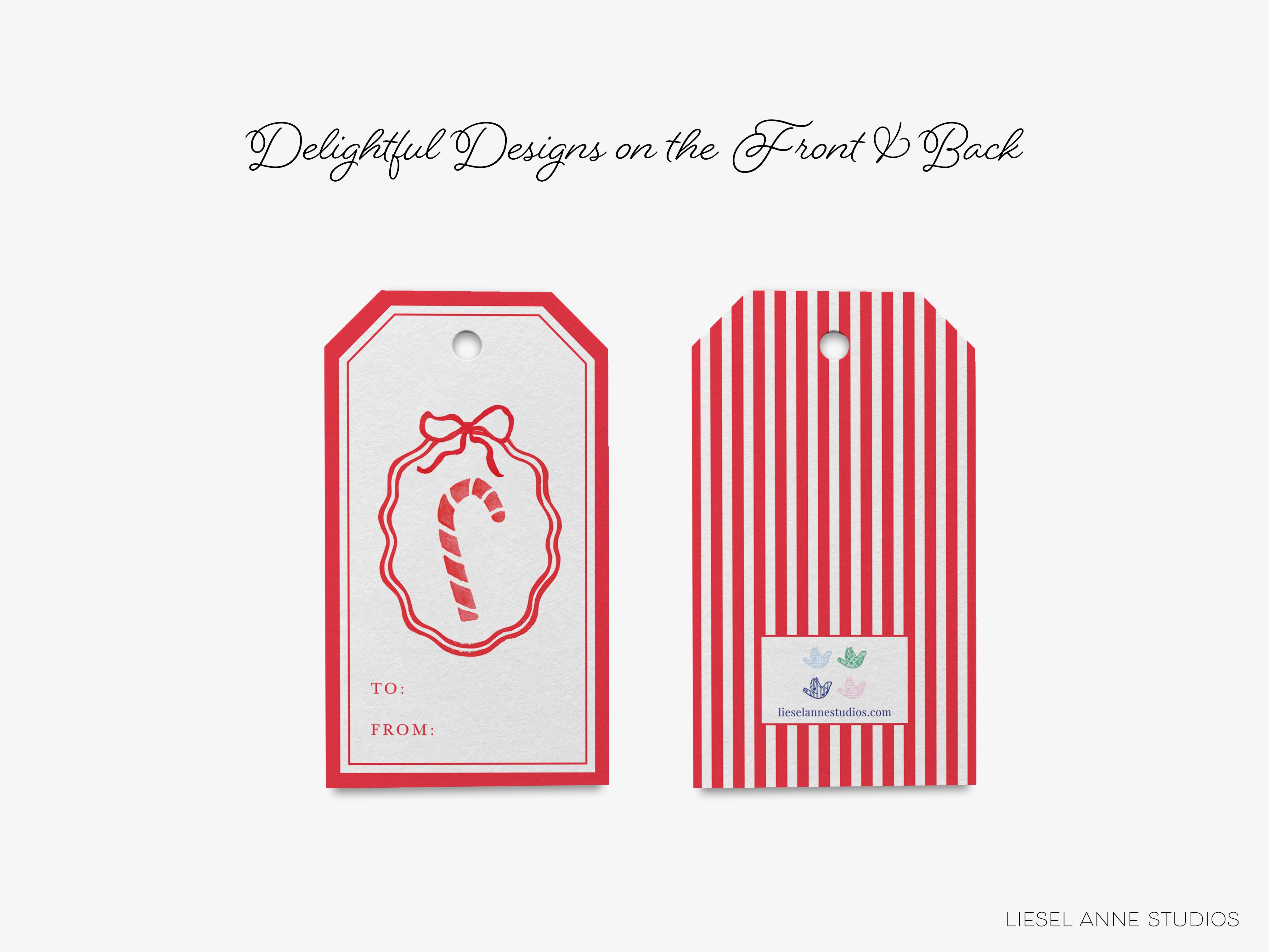 two tags with a red and white striped pattern, one with a bow and the other with a candy cane design.