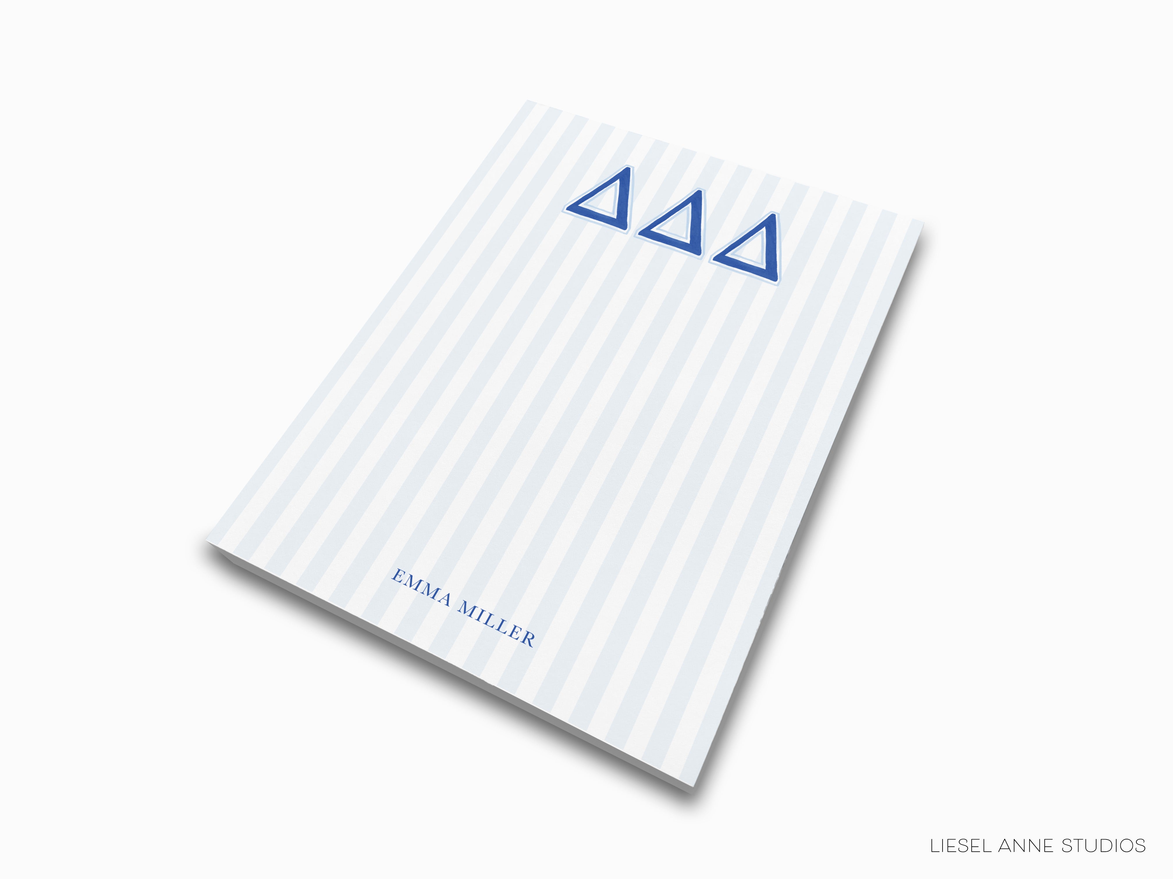 a white and blue book with blue numbers on it