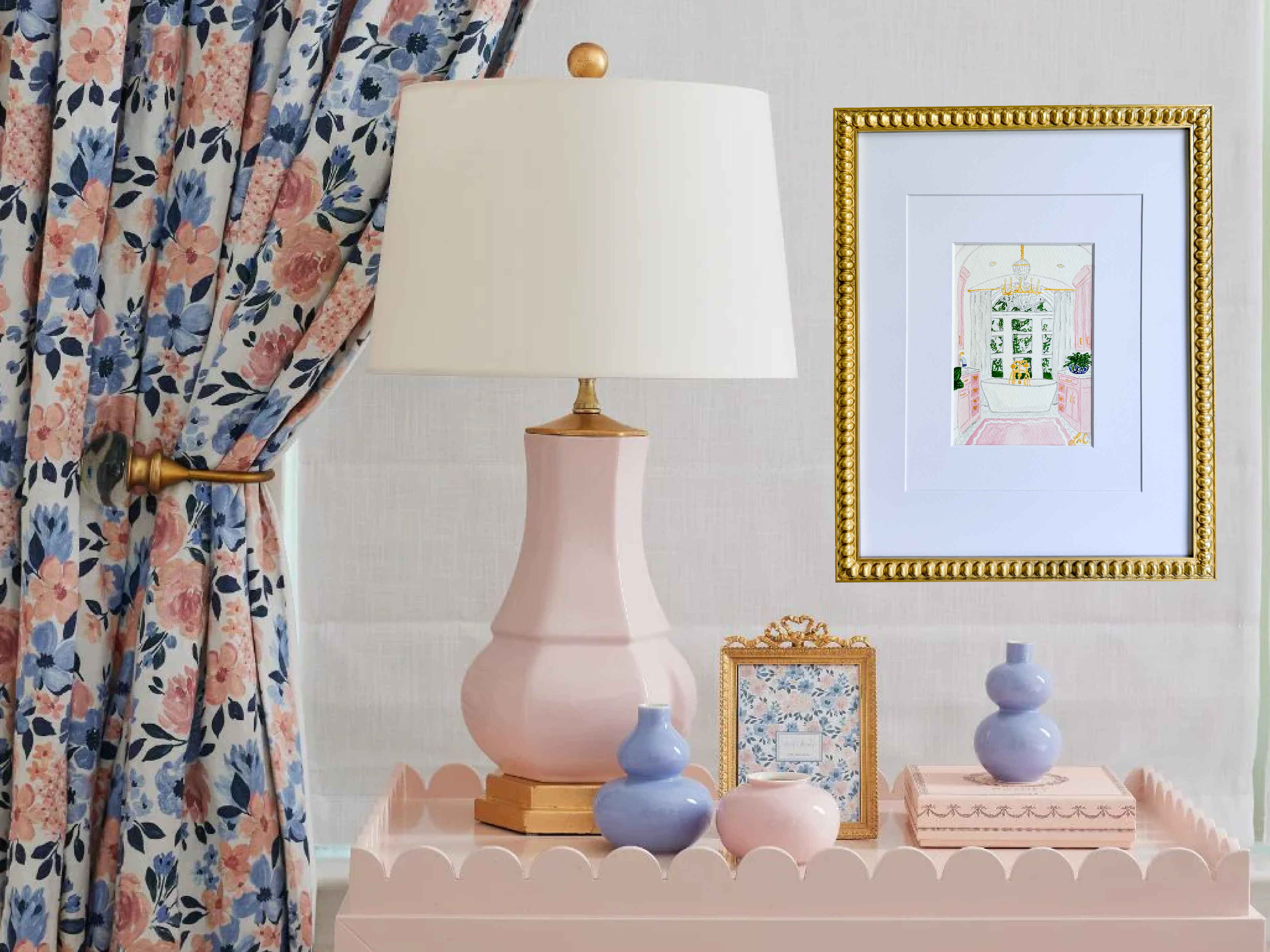 a pink lamp, a framed picture, and a vase on a pink tray, all set against a floral curtain and a white wall.