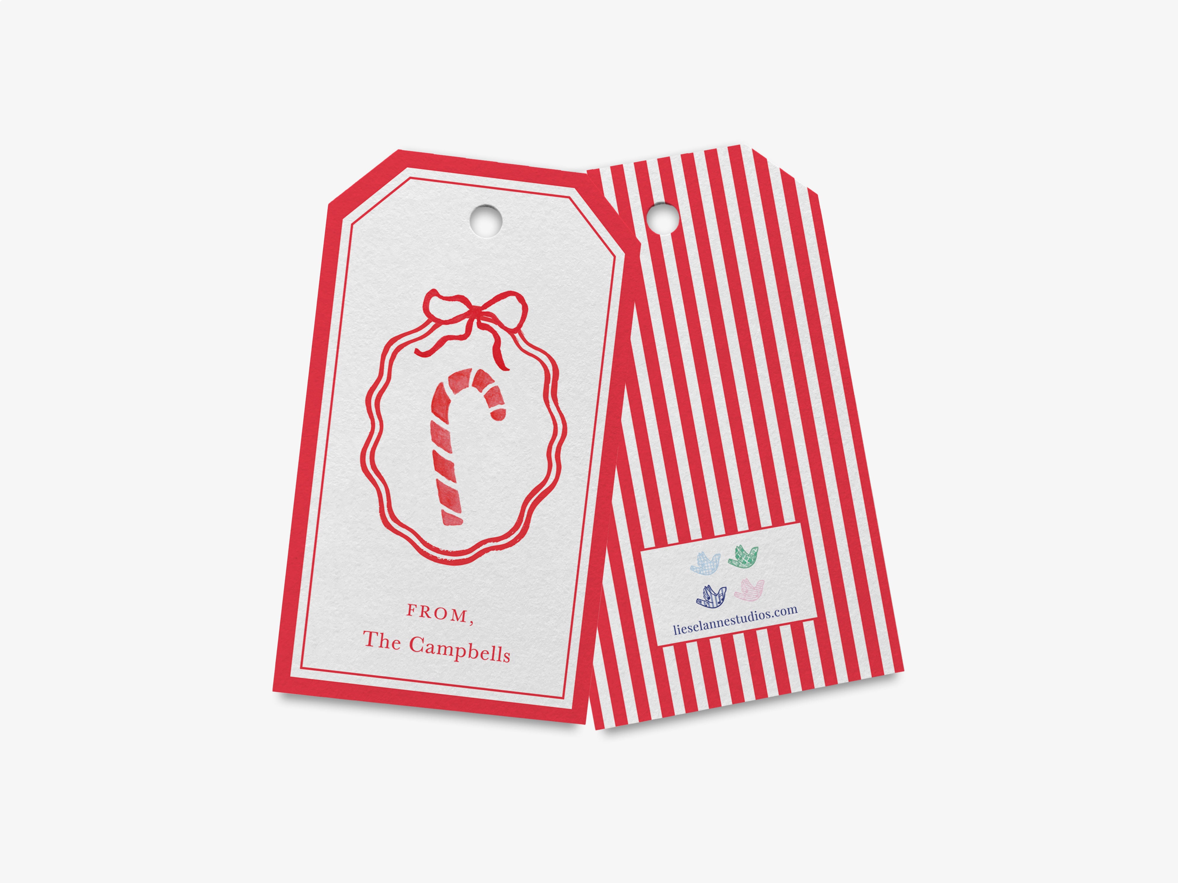 a pair of red and white striped tags with a candy cane design.