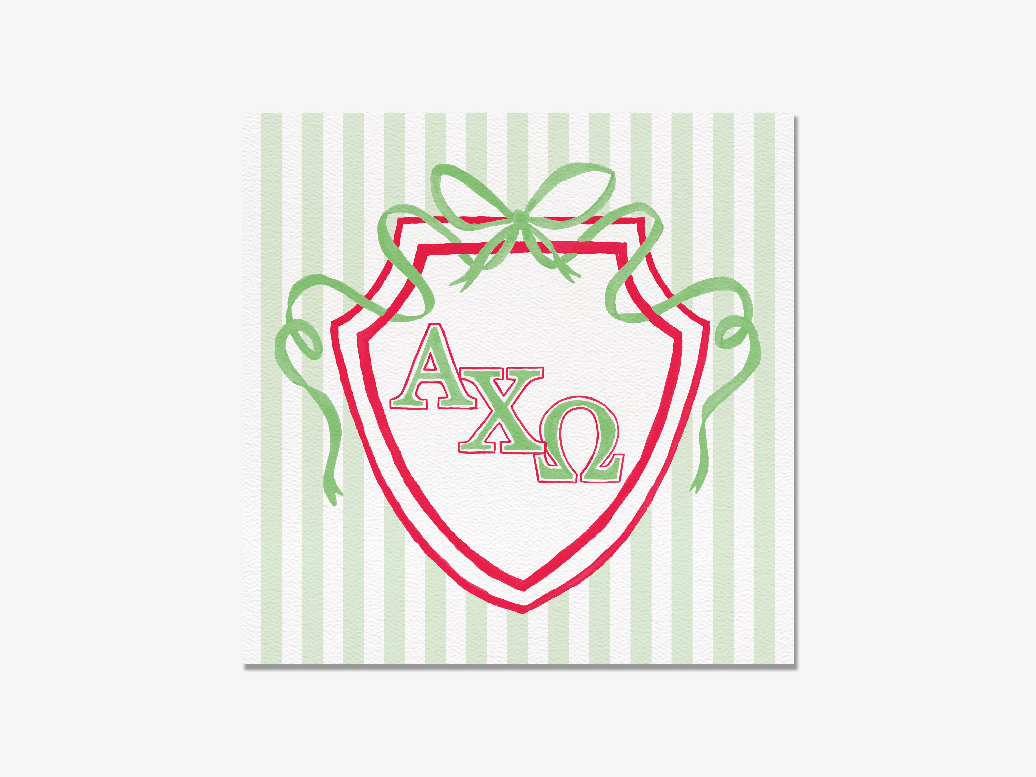 a shield-shaped graphic with the letters 'AXQ' prominently displayed in the center. The shield is surrounded by green ribbons, creating a festive and decorative appearance.