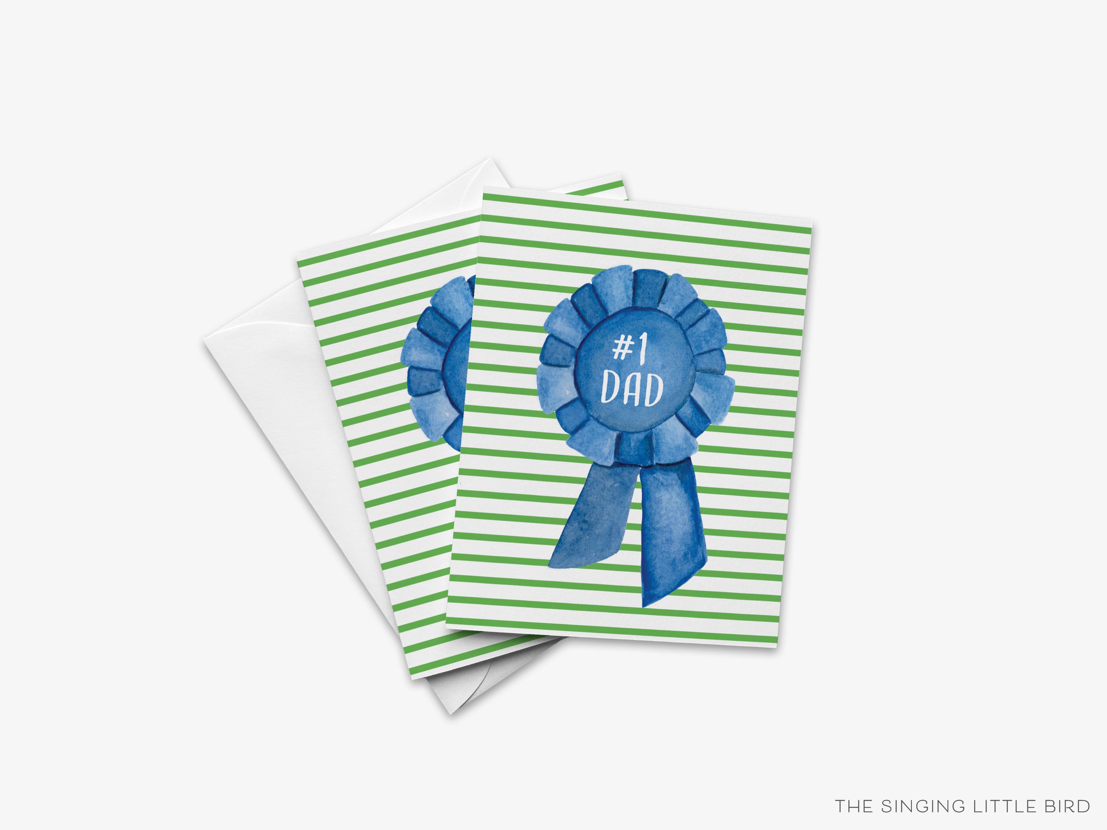 Blue Ribbon #1 Dad Card-These folded greeting cards are 4.25x5.5 and feature our hand-painted blue ribbon, printed in the USA on 100lb textured stock. They come with a White envelope and make a great card for the dad in your life.-The Singing Little Bird