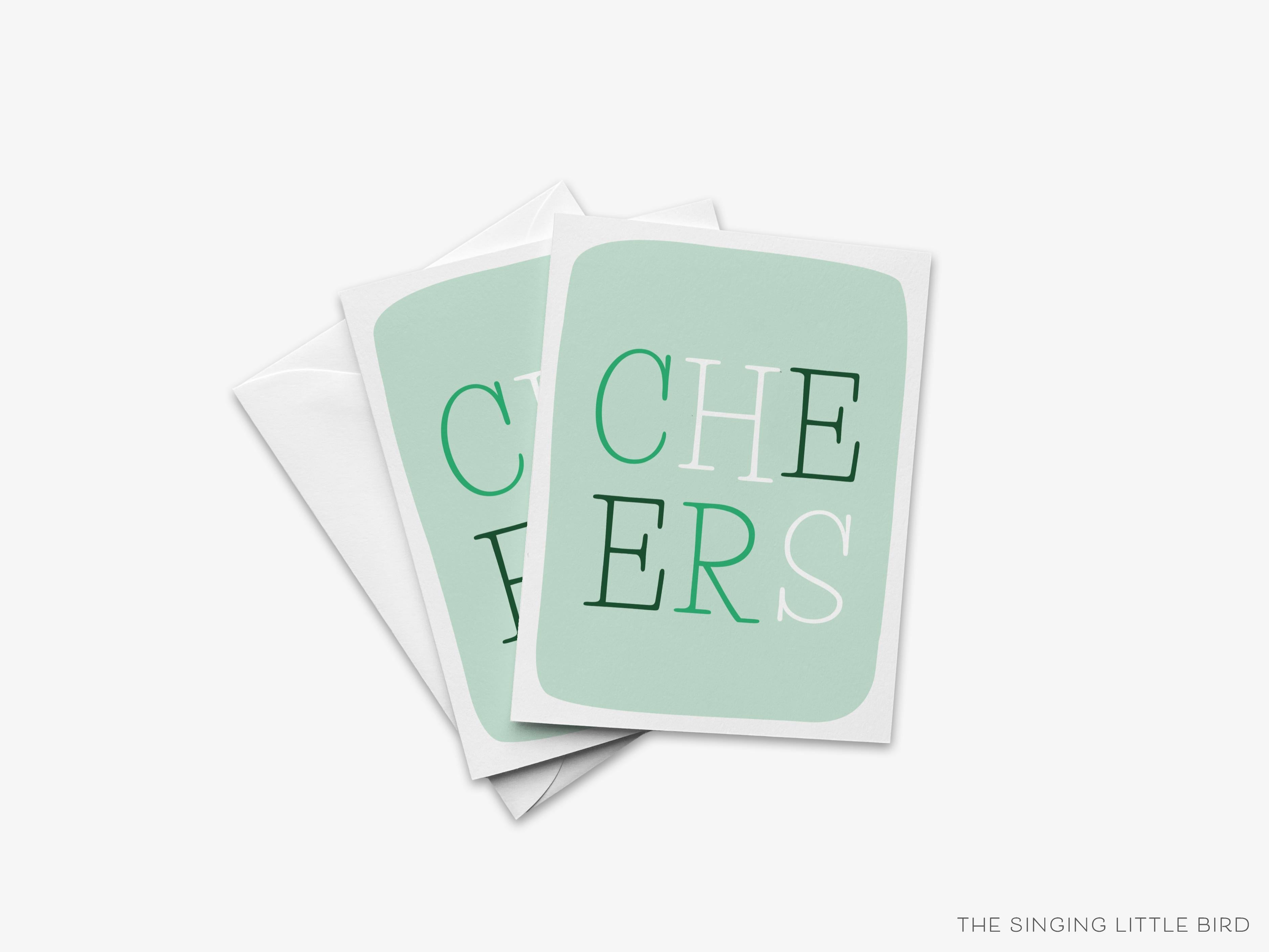 Cheers St. Patrick's Day Greeting Card-These folded spring cards are 4.25x5.5 and feature our hand-painted watercolor cheers, printed in the USA on 100lb textured stock. They come with a White envelope and make a lovely card to say Happy St. Patrick's Day or congratulations to your family and friends. -The Singing Little Bird