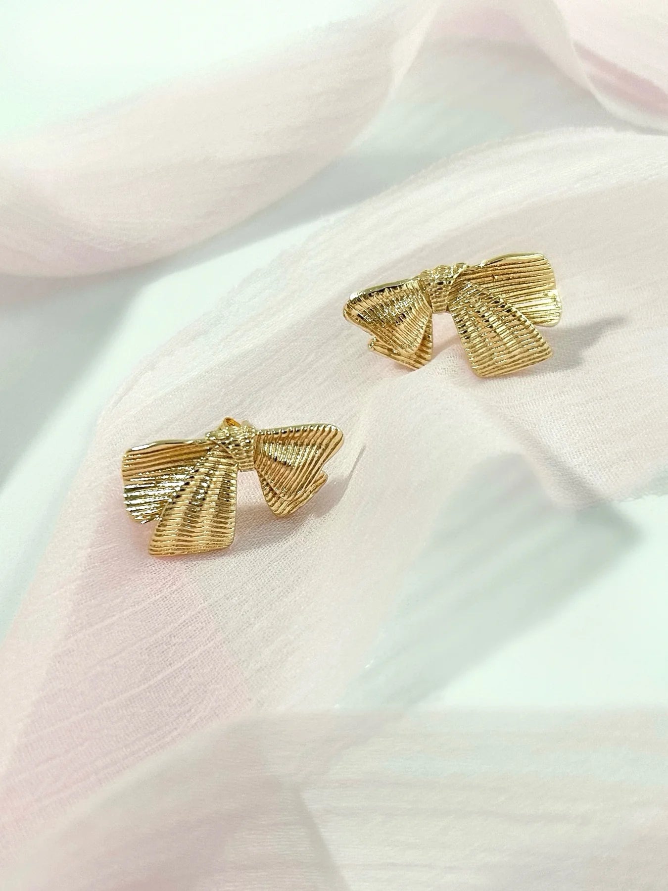 Textured Golden Bow Stud Earrings