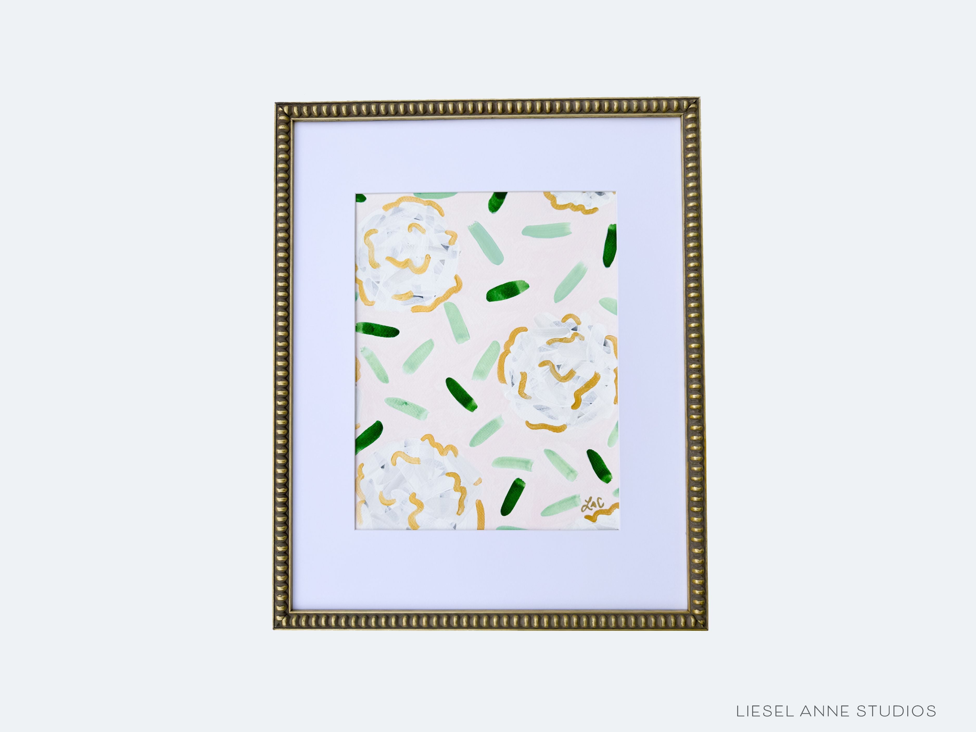 Golden Hydrangea | Blush & White VI-Original artwork measures 11"x14" | Hand-Painted with gouache on cold press watercolor paper | Matted and framed in gold wood frame sized 16"x20" | Glare-resistant glass | Hanging hardware included | Features our signature Golden Hydrangea design with a pale pink base, white hydrangeas and shimmery gold accents | Initialed in gold by the Liesel Anne (the artist) on the front and signed and dated on the back.-The Singing Little Bird