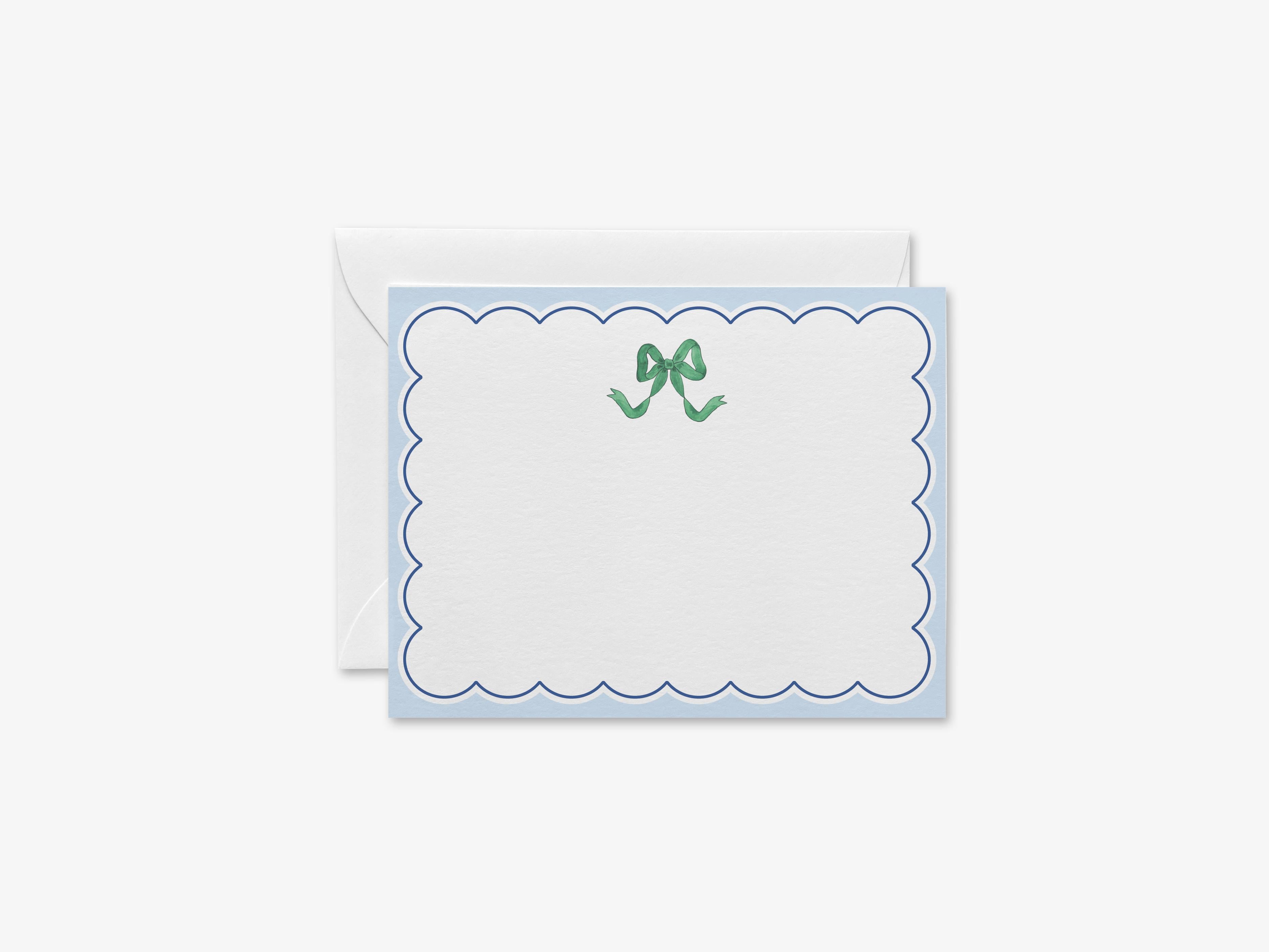 Green and Blue Bow Flat Notes-These personalized flat notecards are 4.25x5.5 and feature our hand-painted watercolor green bow, and on the back of this stationery features our signature golden bow design on a navy base with whimsical green bows and white confetti, printed in the USA on 120lb textured stock. They come with your choice of envelopes and make great thank yous and gifts for the bow lover in your life.-The Singing Little Bird
