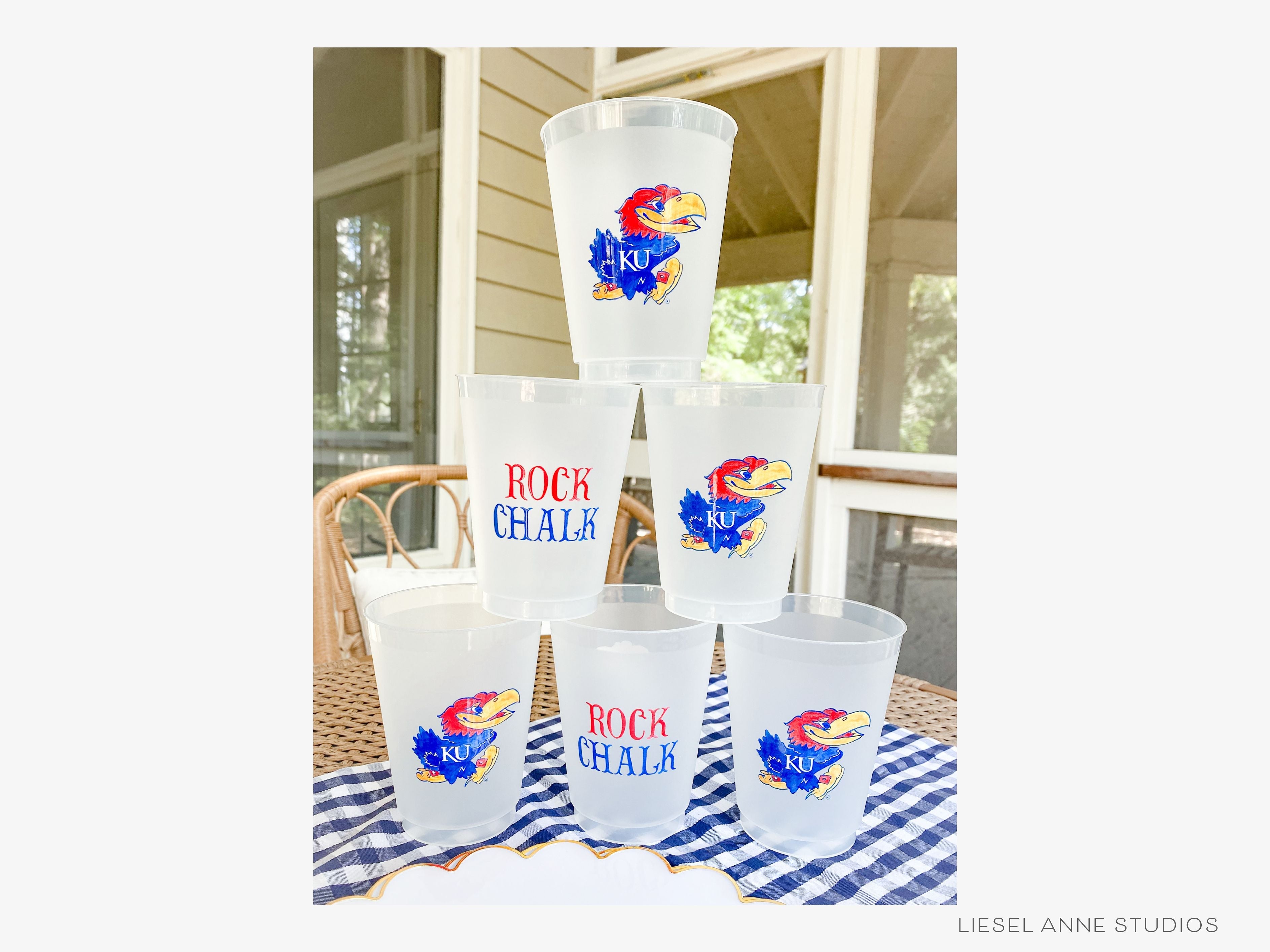 Jayhawk *Officially Licensed* 16oz Shatterproof Cups (Set of 8)-These officially licensed Kansas Jayhawk shatterproof cups feature our hand-painted Jayhawk and Rock Chalk text and make great party decorations for watch parties, graduation, game days and more! They come in sets of 8 and are re-usable for other parties to come or make wonderful party favors!-The Singing Little Bird