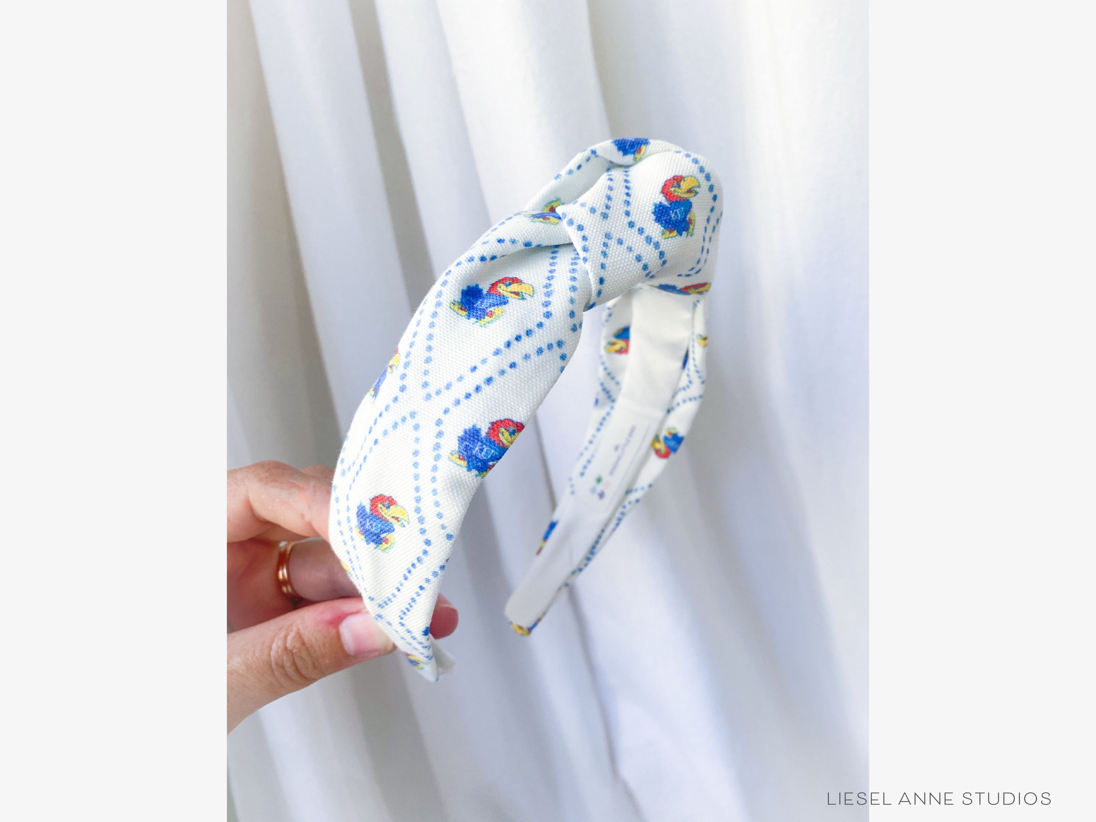 Jayhawk Officially Licensed Blue and White Dotted Diamond Headband-These fabric headbands make unique one-of-a-kind gifts as each one is slightly different. They are cut from our hand-painted signature print. These are the perfect accessory and make great gifts!-The Singing Little Bird