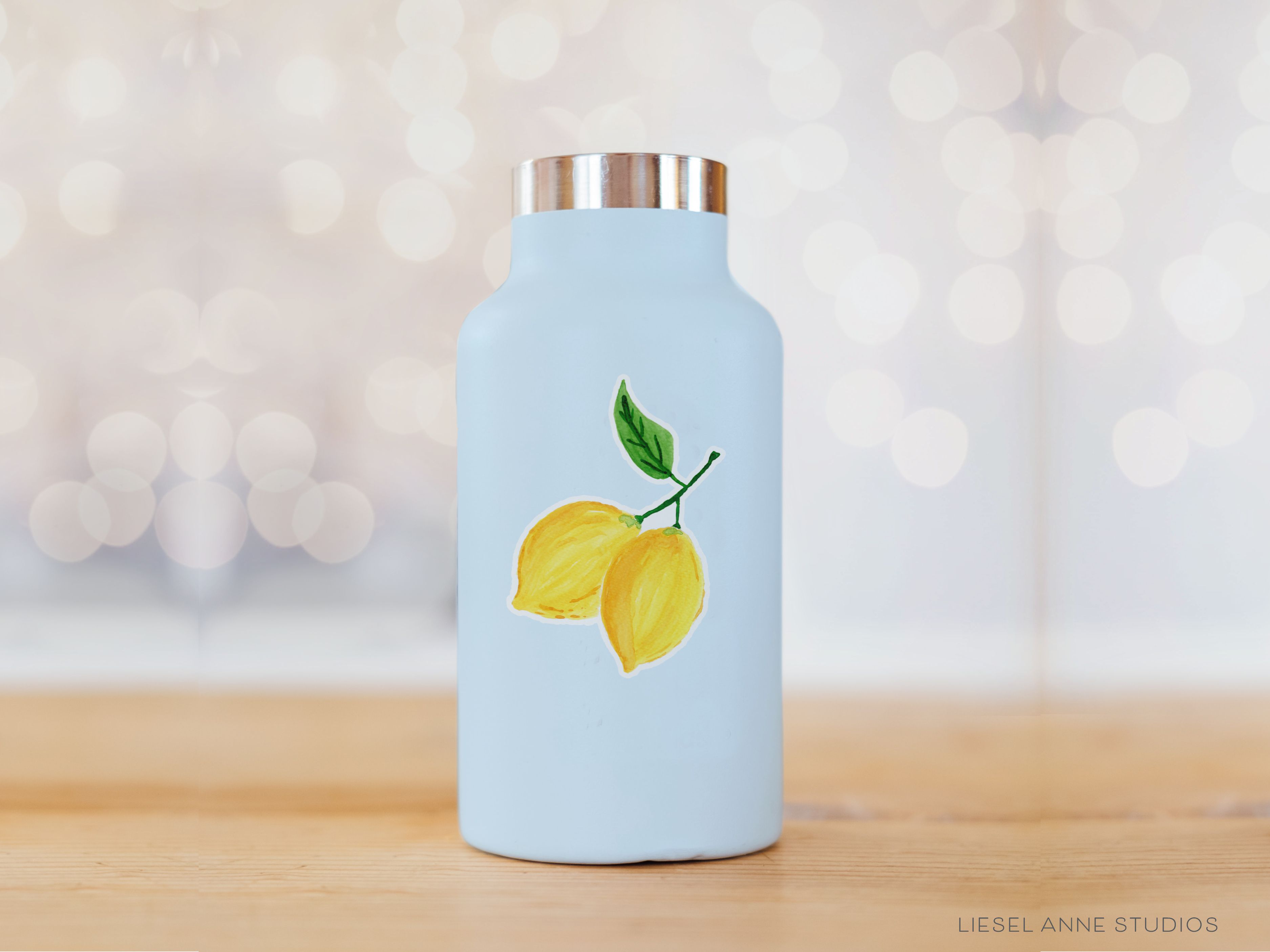 Lemon Vinyl Sticker-These weatherproof die cut stickers feature our hand-painted watercolor lemon, making great laptop or water bottle stickers or gifts for the citrus in your life.-The Singing Little Bird