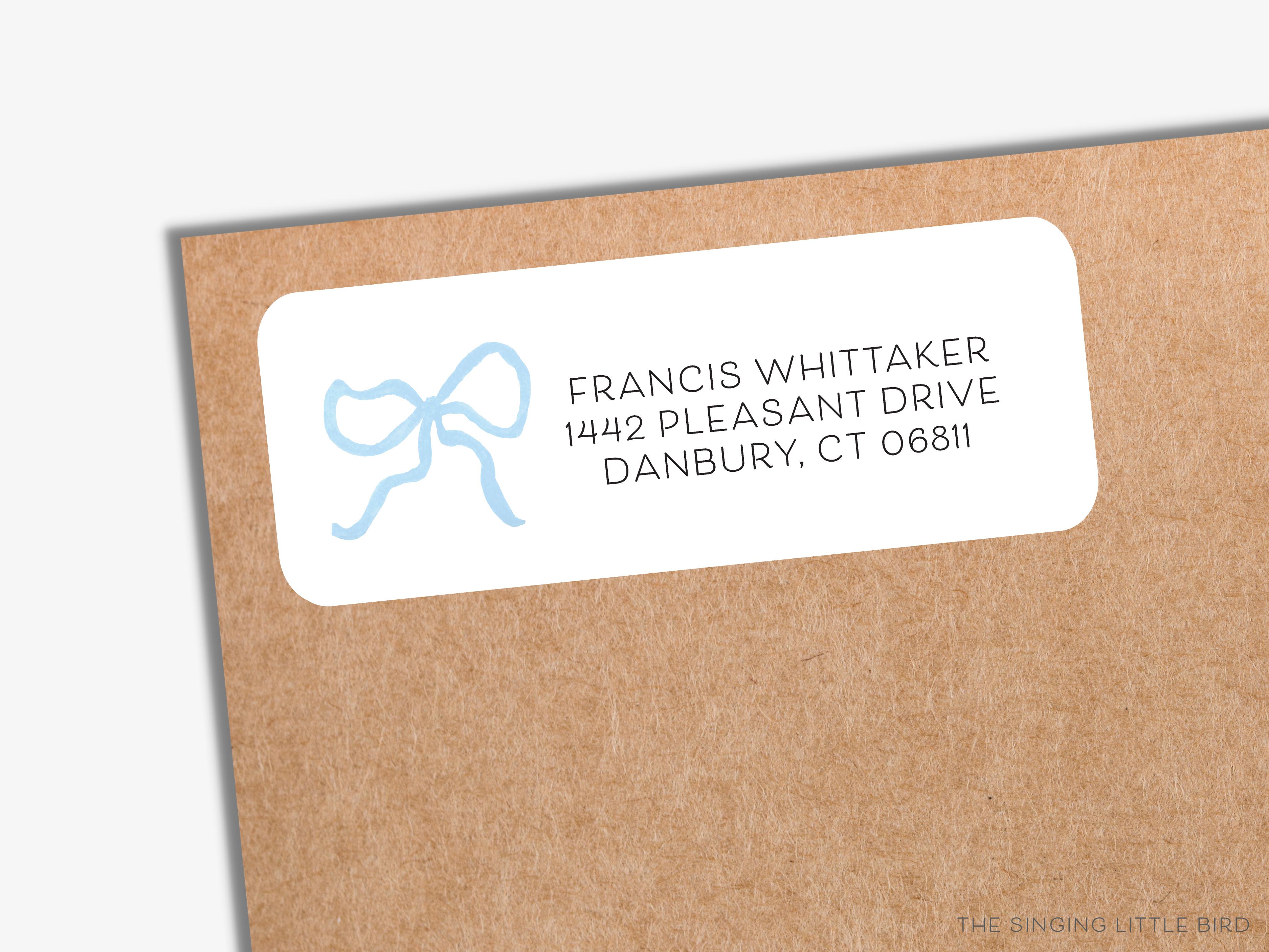 Light Blue Bow Return Address Labels-These personalized return address labels are 2.625" x 1" and feature our hand-painted watercolor bow, printed in the USA on beautiful matte finish labels. These make great gifts for yourself or the bow lover.-The Singing Little Bird