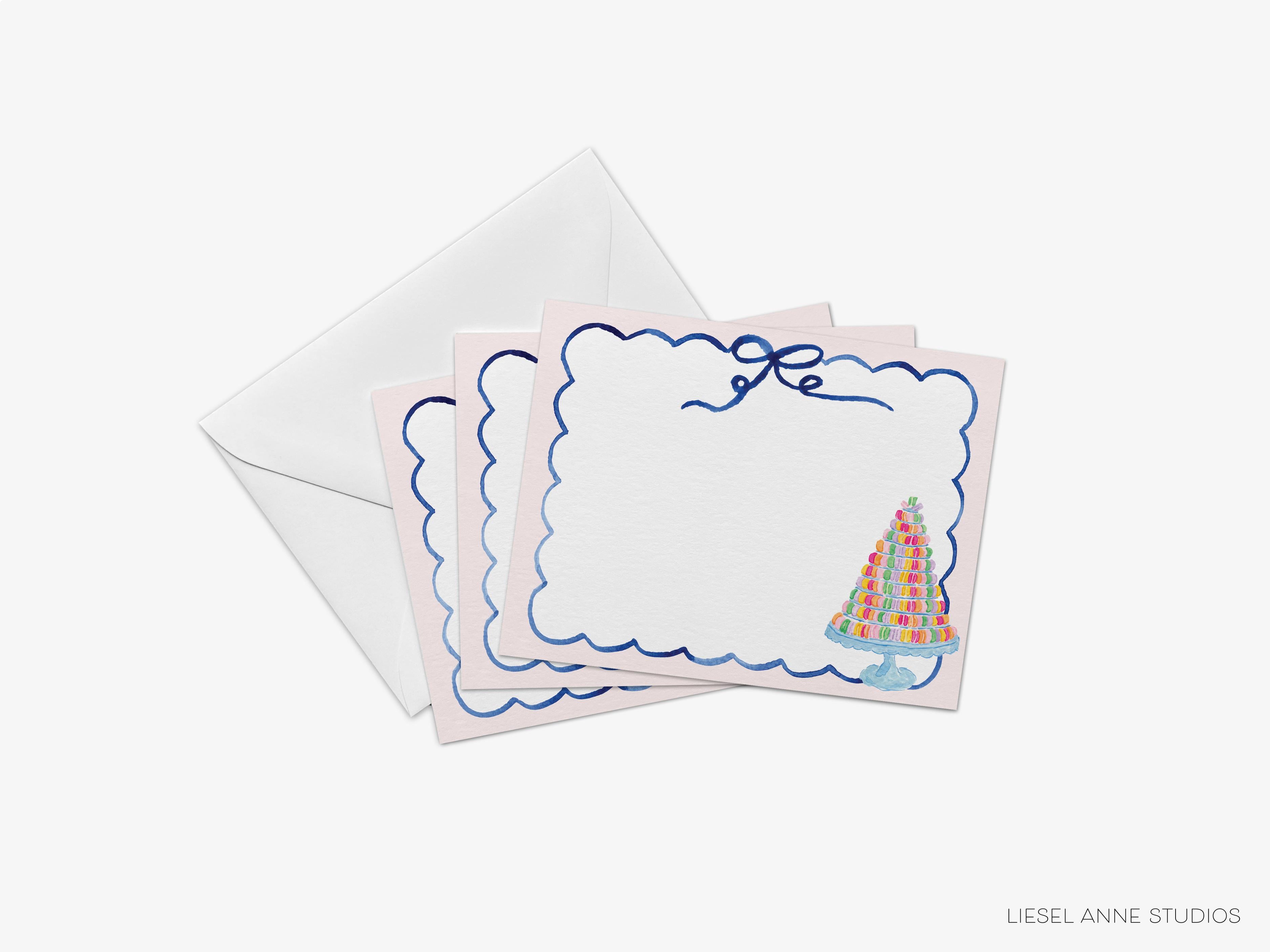 Macaron Tower Flat Notes-These personalized flat notecards are 4.25x5.5 and feature our hand-painted watercolor macarons, printed in the USA on 120lb textured stock. They come with your choice of envelopes and make great thank yous and gifts for the Parisian lover in your life.-The Singing Little Bird