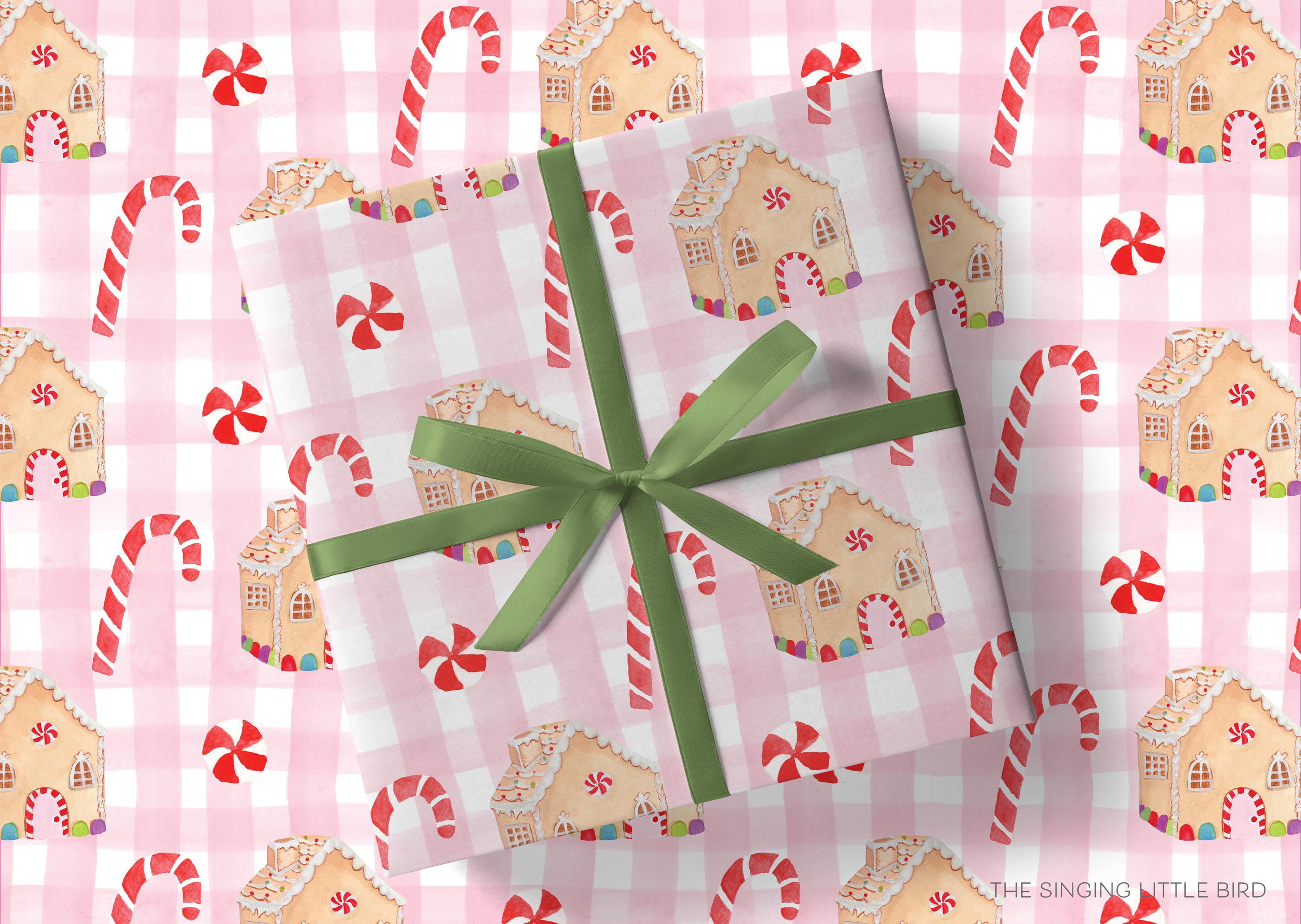 Pink Gingerbread Christmas Gift Wrap-This matte finish gift wrap features our hand-painted watercolor gingerbread houses and candy canes. It makes a perfect wrapping paper for a holiday present. -The Singing Little Bird