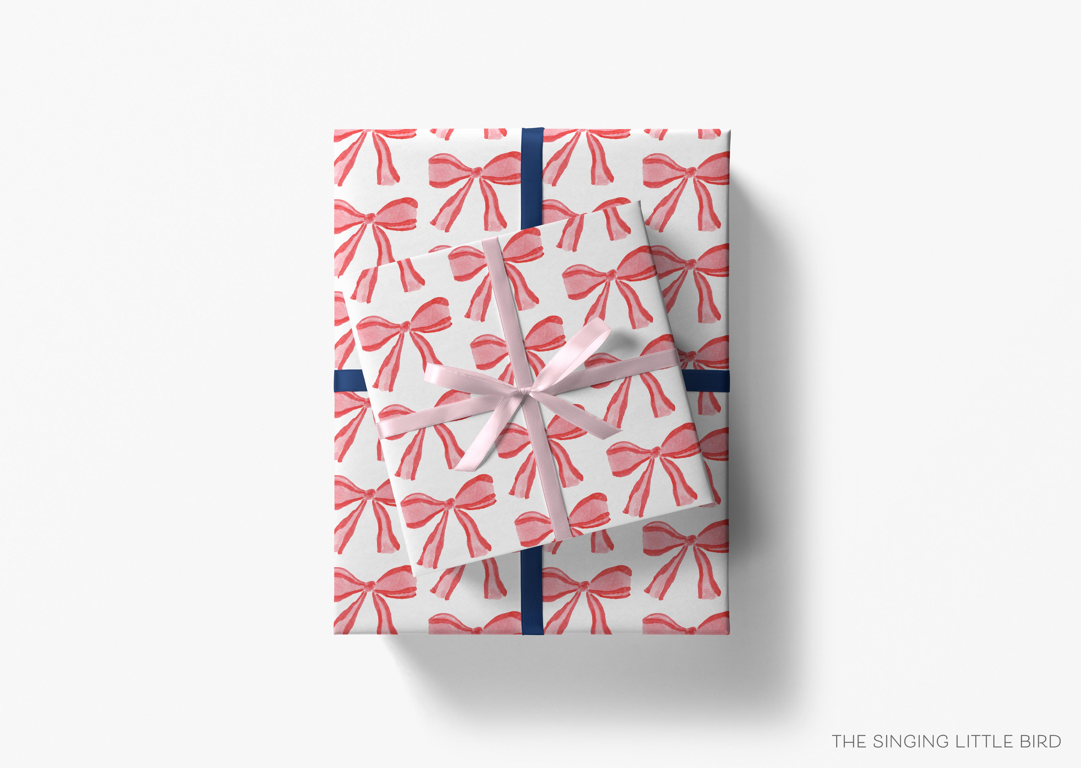 Red Bow Gift Wrap-This matte finish gift wrap features our hand-painted watercolor bows. It makes a perfect wrapping paper for any celebration present. -The Singing Little Bird