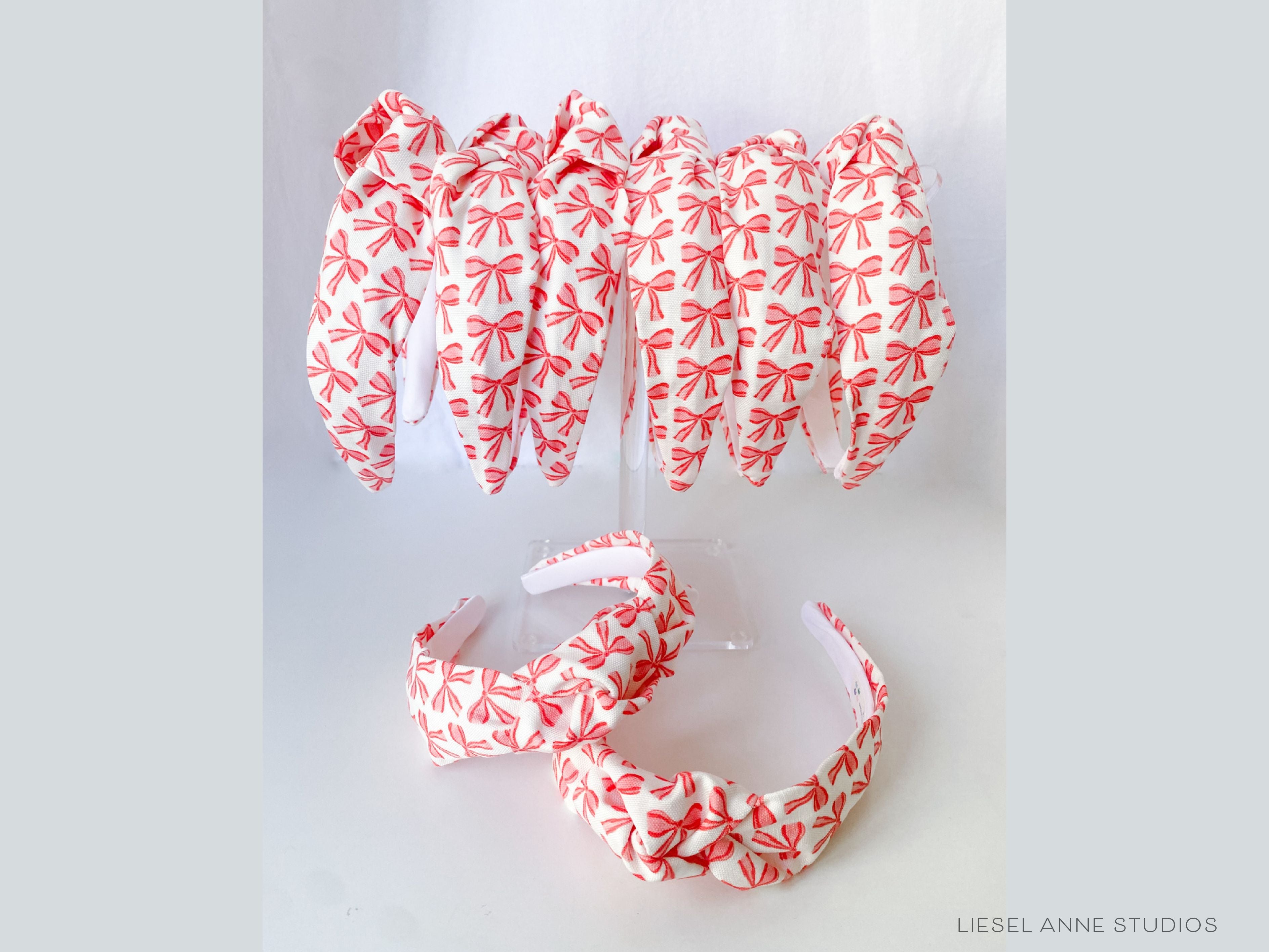 Red Bow Top Knot Headband-These fabric headbands make unique one-of-a-kind gifts as each one is slightly different. They are cut from our hand-painted signature print. These are the perfect accessory and make great gifts!-The Singing Little Bird