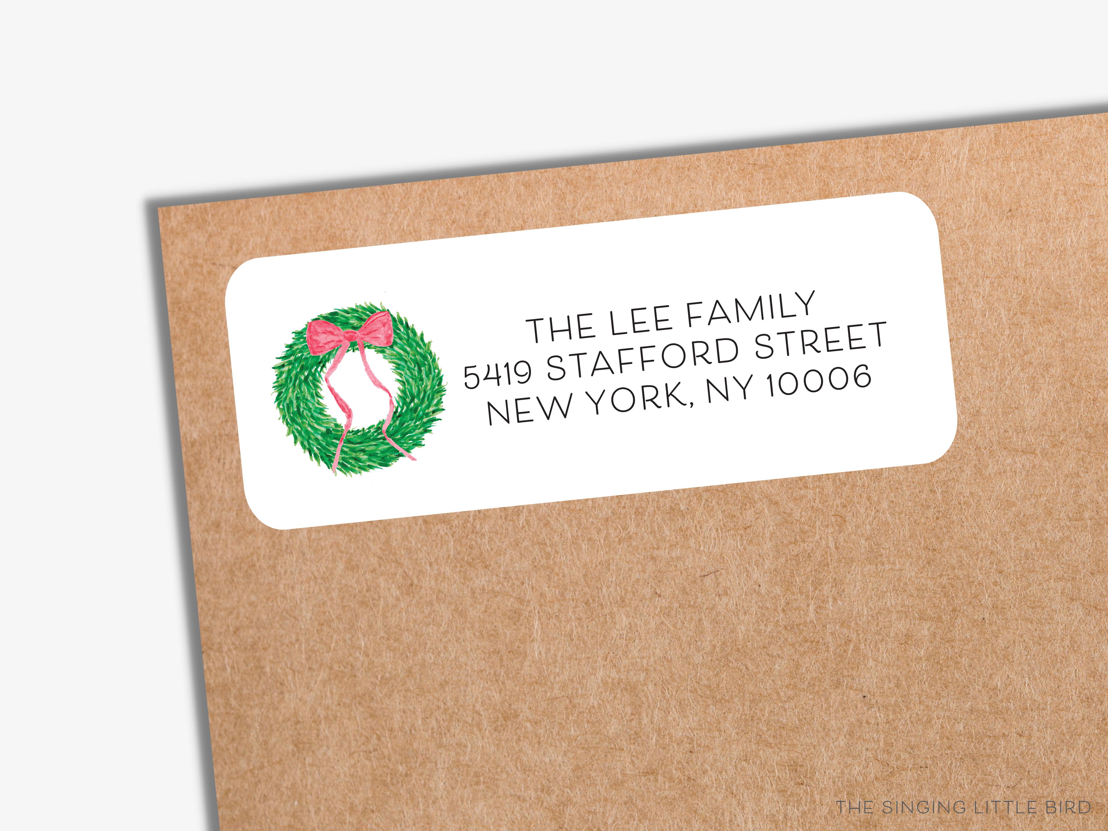 Wreath With Red Bow Return Address Labels-These personalized return address labels are 2.625" x 1" and feature our hand-painted watercolor wreath with red bow, printed in the USA on beautiful matte finish labels. These make great gifts for yourself or the Christmas wreath lover.-The Singing Little Bird