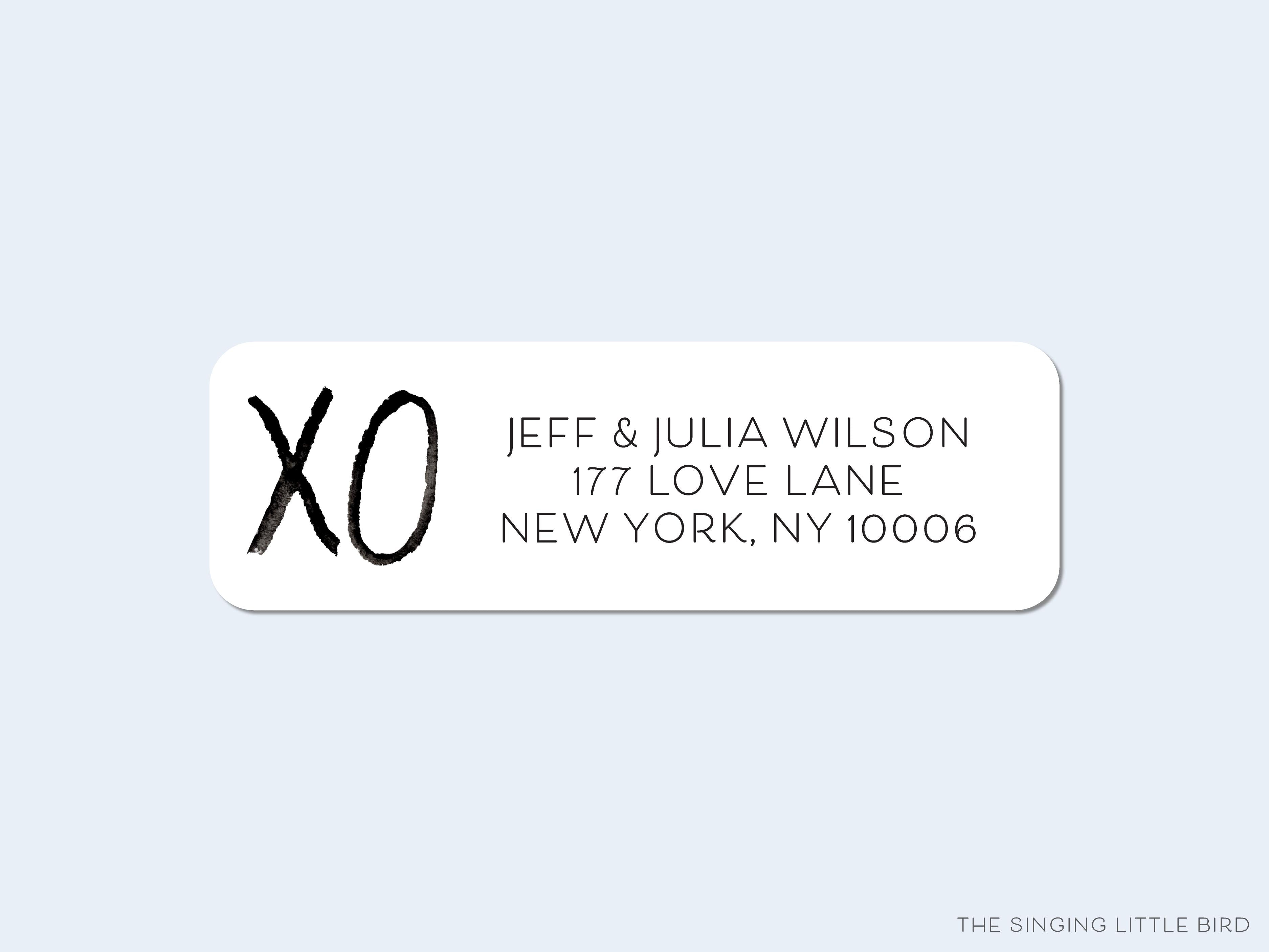 XO Black and White Return Address Labels-These personalized return address labels are 2.625" x 1" and feature our hand-painted watercolor XO, printed in the USA on beautiful matte finish labels. These make great gifts for yourself or the hugs and kisses lover.-The Singing Little Bird