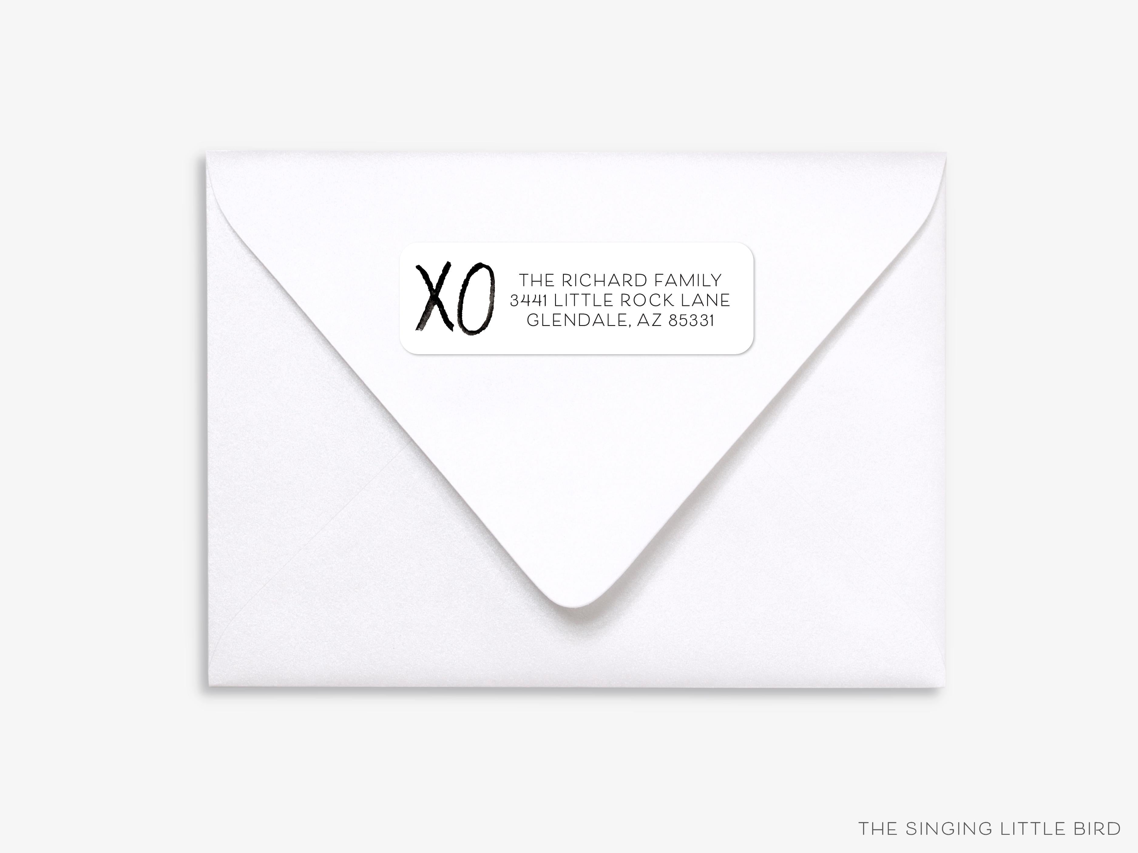 XO Black and White Return Address Labels-These personalized return address labels are 2.625" x 1" and feature our hand-painted watercolor XO, printed in the USA on beautiful matte finish labels. These make great gifts for yourself or the hugs and kisses lover.-The Singing Little Bird