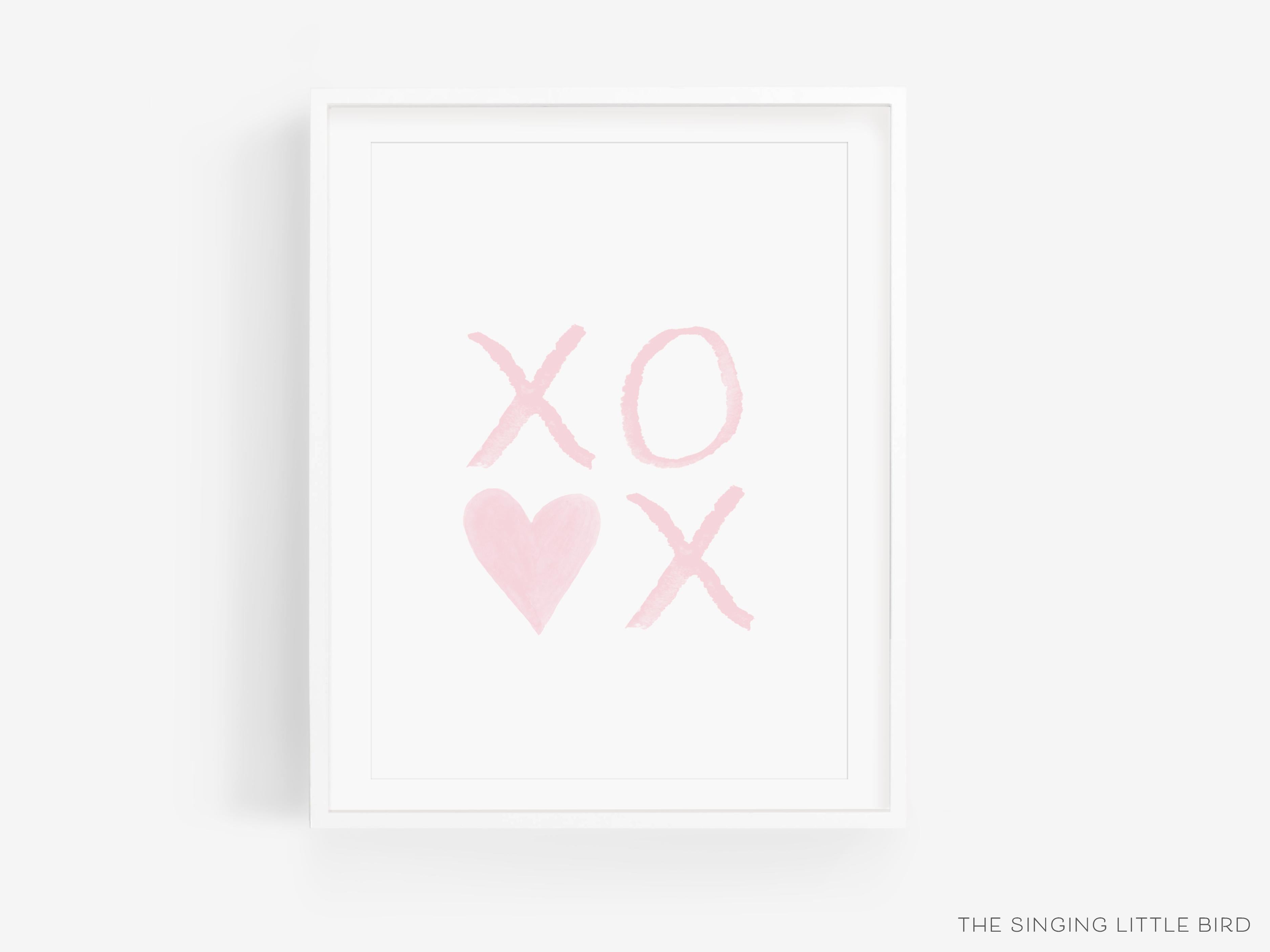XOXO Pink with Heart Art Print-This watercolor art print features our hand-painted xo's and heart, printed in the USA on 120lb high quality art paper. This makes a great gift or wall decor for the hugs and kisses lover in your life.-The Singing Little Bird