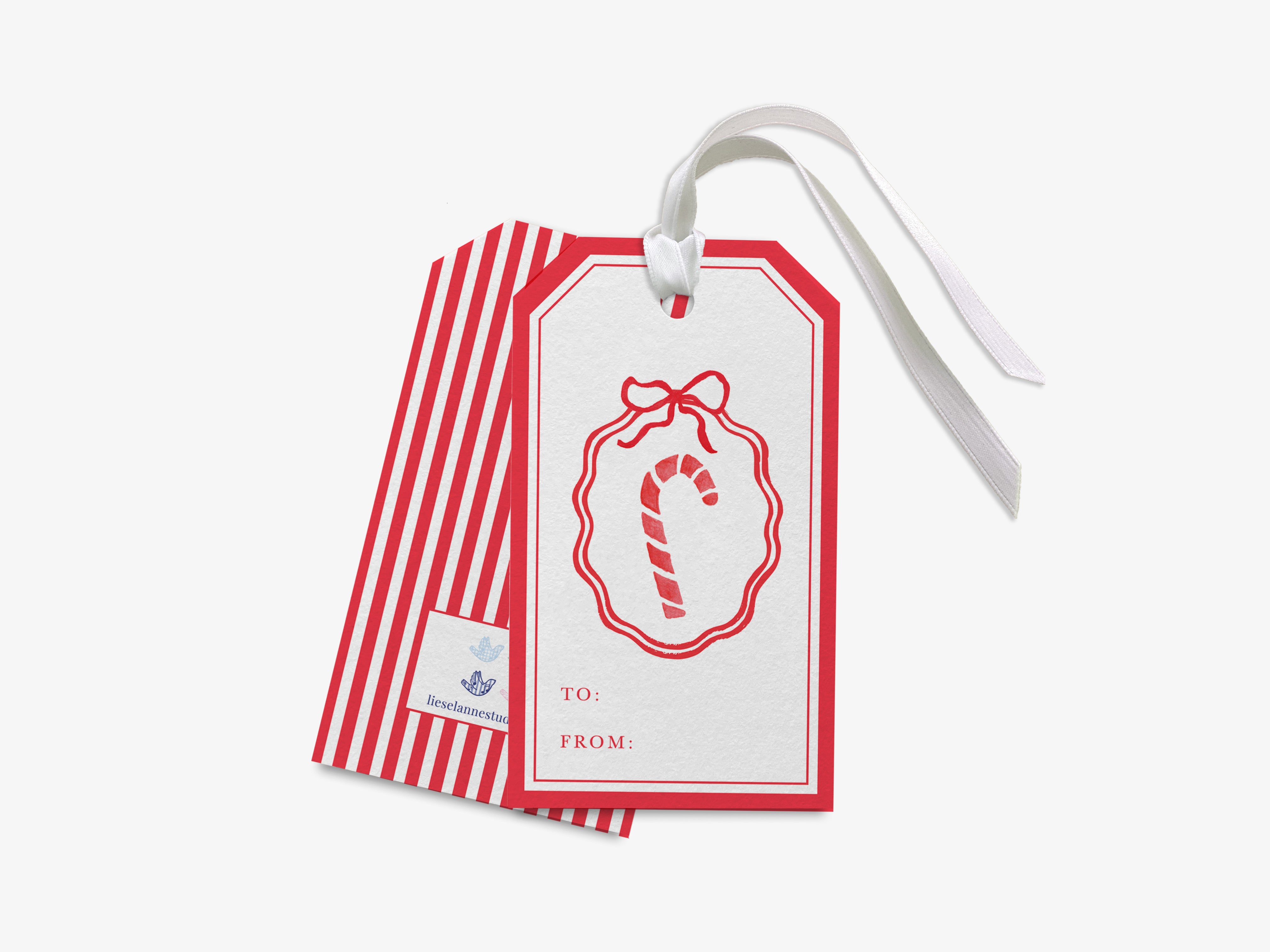 A red and white striped gift tag with a red bow and a candy cane illustration, attached to a white ribbon.