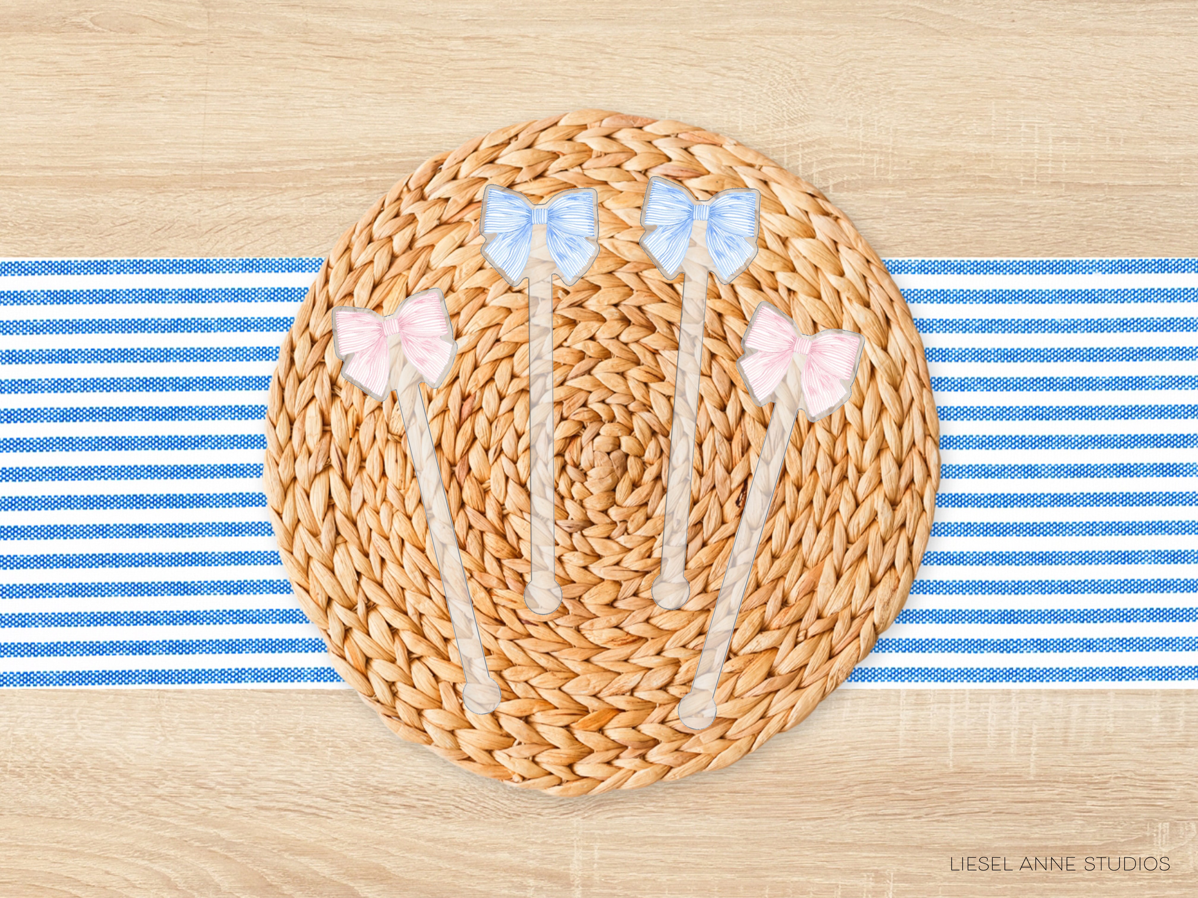 A woven placemat with a blue and white striped tablecloth underneath, featuring four small bows in pink and blue.